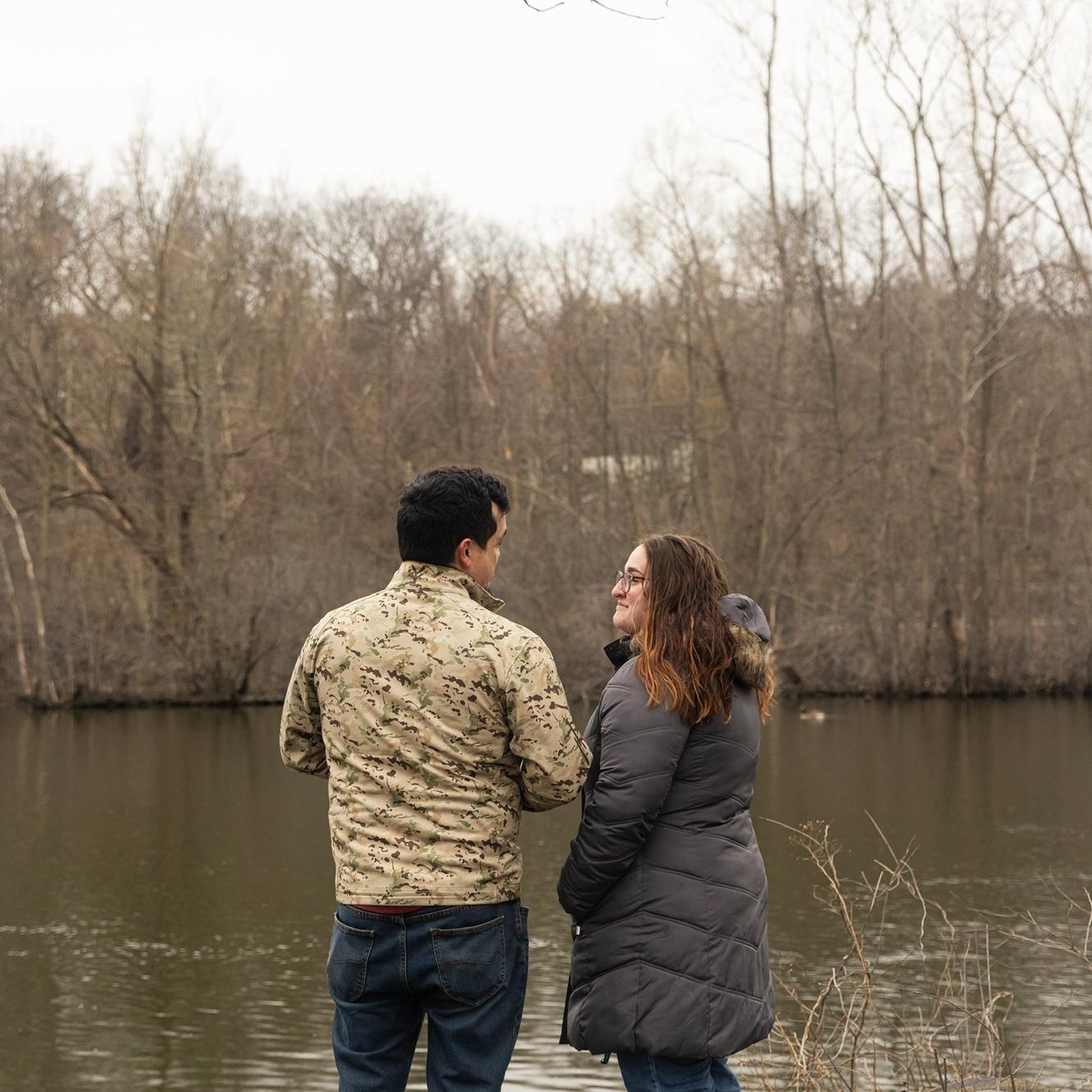 A photographer sneakily snapped this photo as Luke began to propose to Courtney.