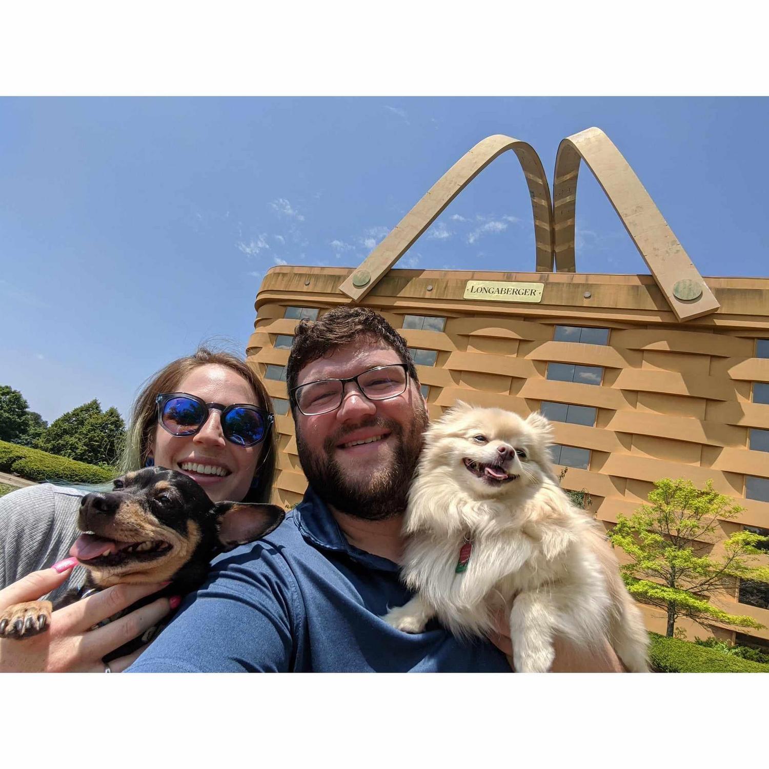 Our whole fam in front of a giant basket building in Ohio.