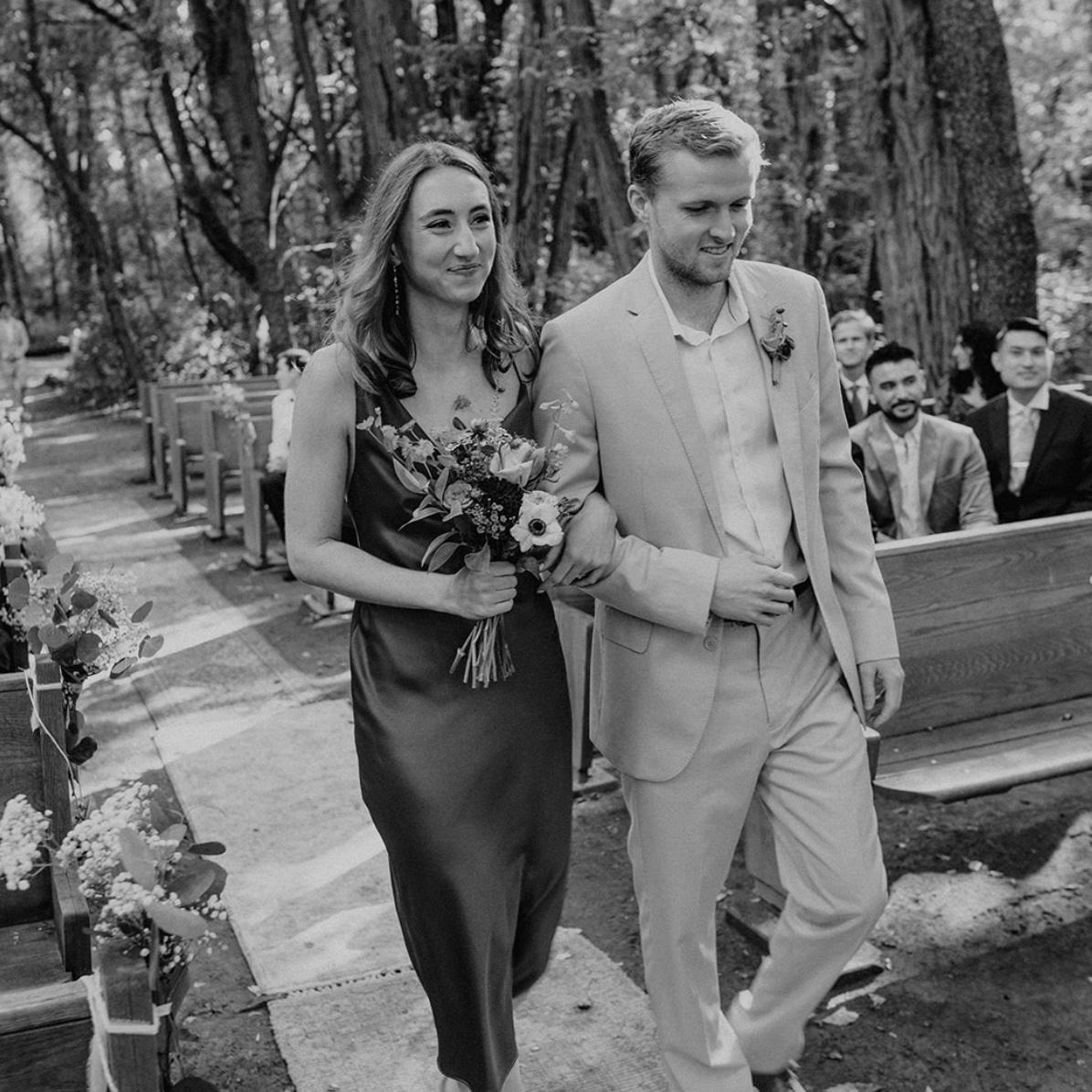 We've actually walked down the aisle together before! This is from our friends Leila and Cameron's wedding.