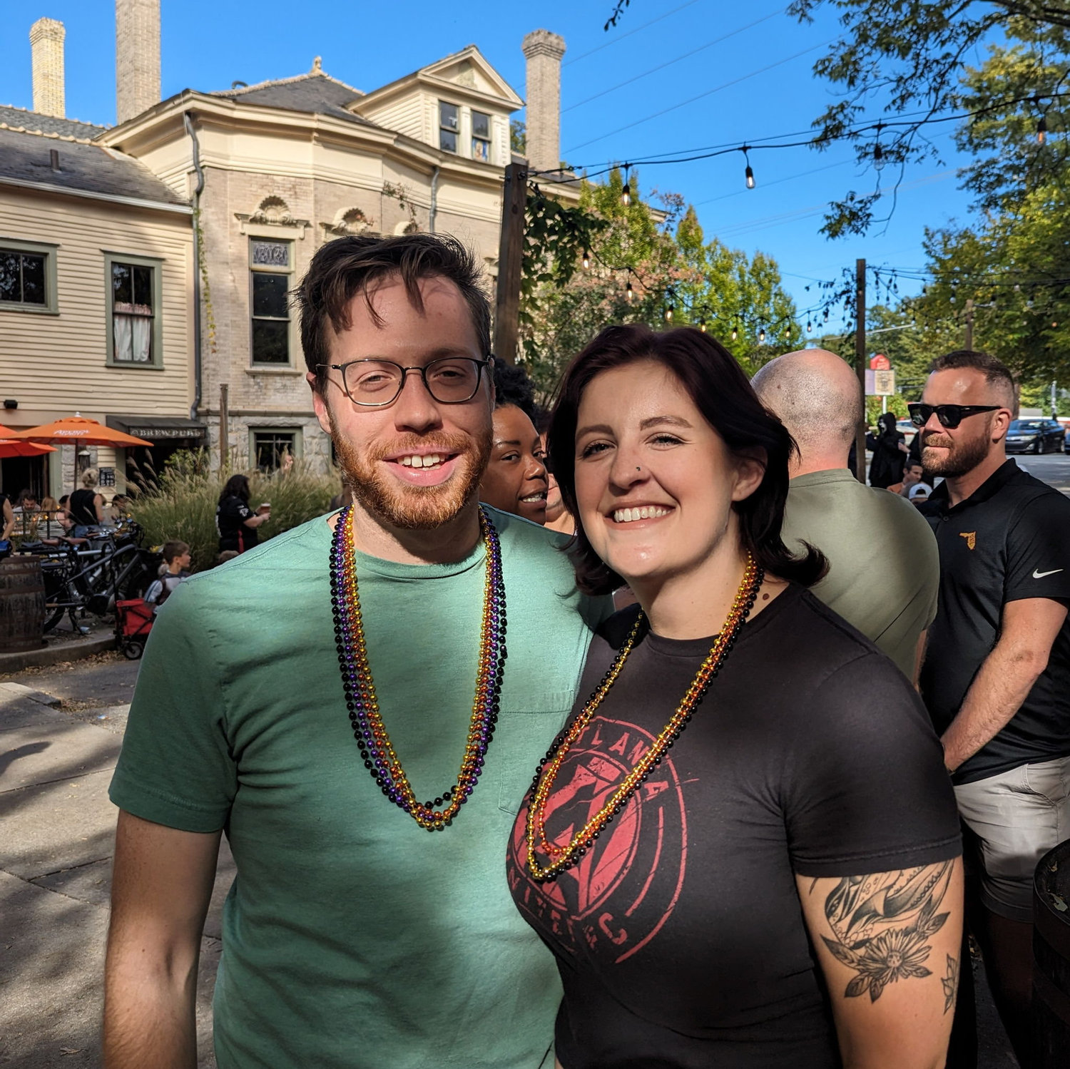October 2023. Our first ever photo together! We're outside Wrecking Bar right after the Little 5 Points Halloween Parade.