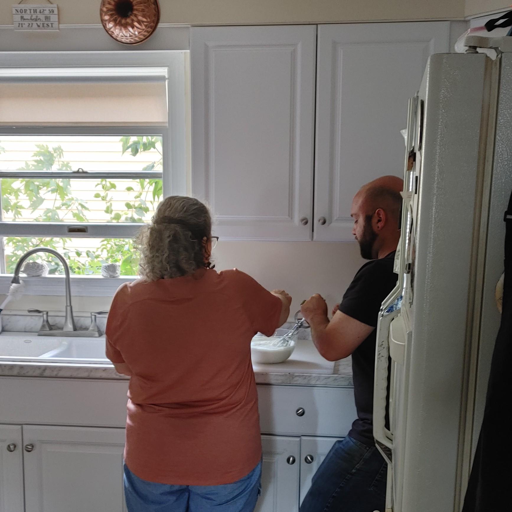 July 10, 2022 - Joe and his mother Kathy make home-made whipped cream for the strawberry shortcake dessert we're having after Chinese food dinner with Shawn and his mother Carissa.