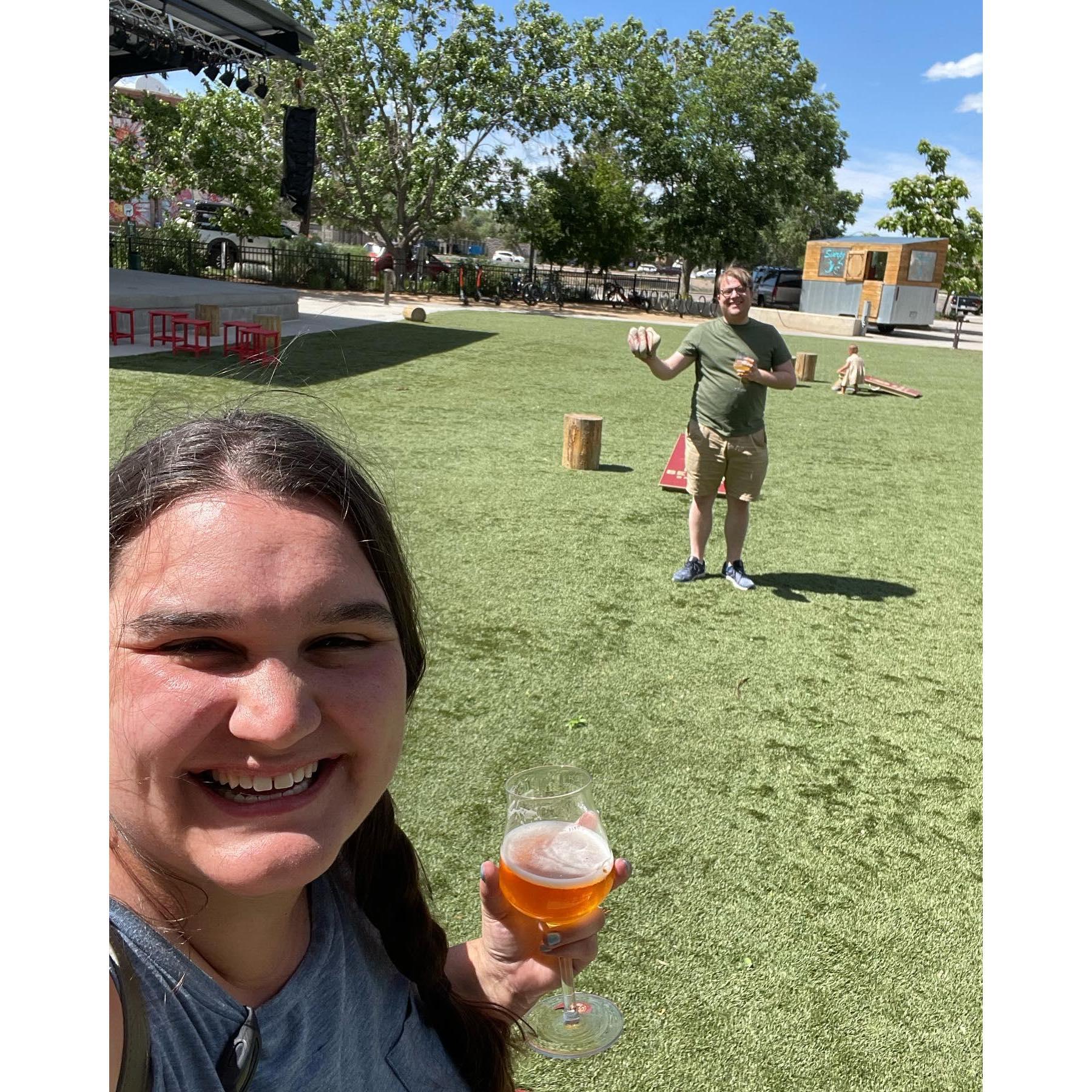 Bet you can't guess who won at cornhole after drinking several beers on the New Belgium brewery tour