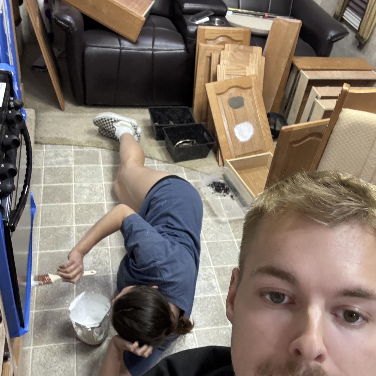 A candid picture of us during our trailer renovation