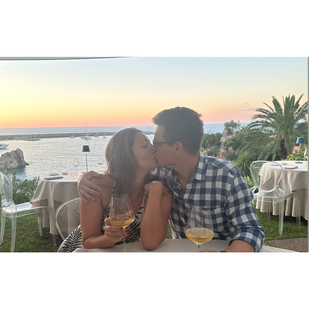 Enjoying a fabulous meal together in Sicily.