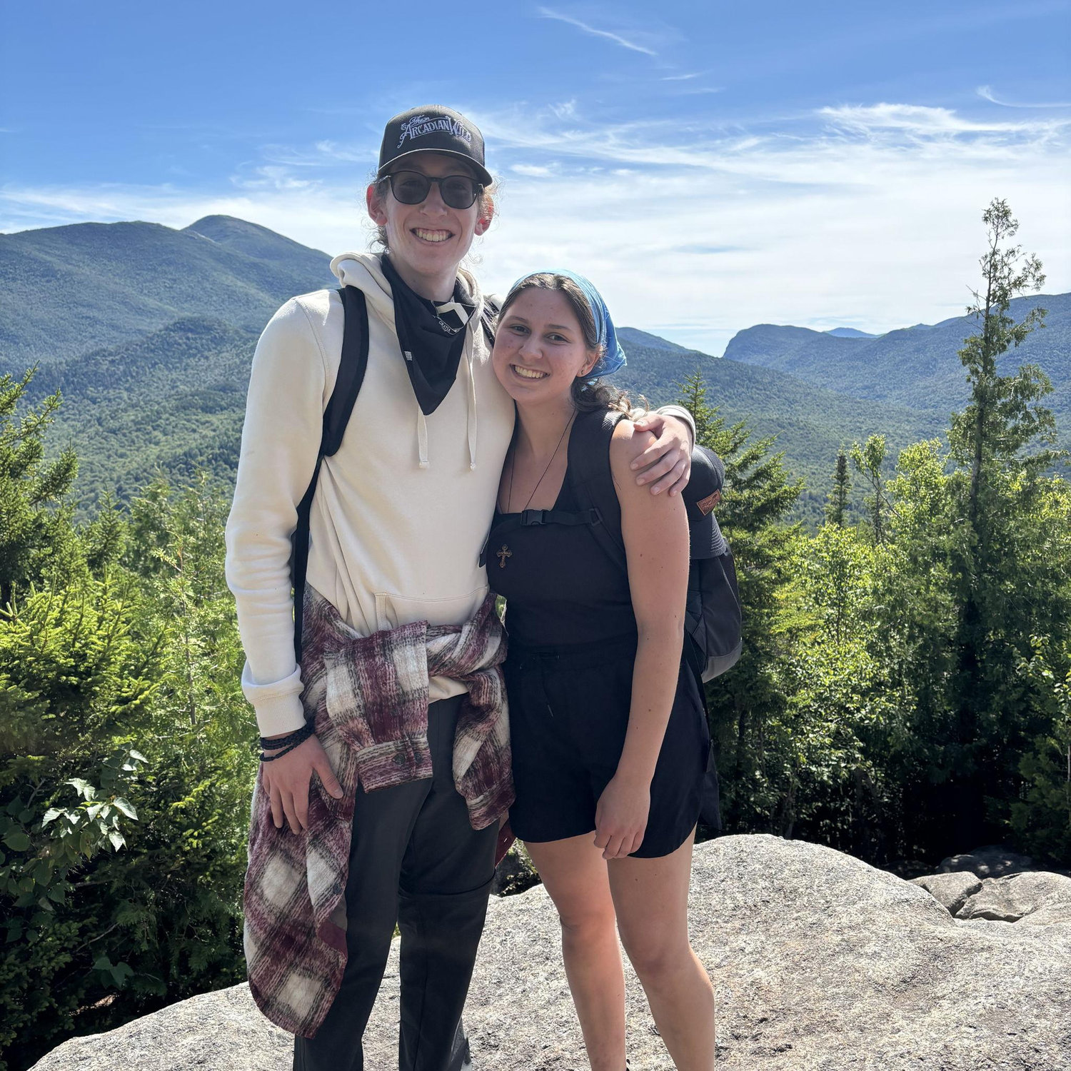 Hiking in the Adirondack mountains as student staff on the Templeton Honors College camping trip in summer 2025. We met on this trip in 2024!