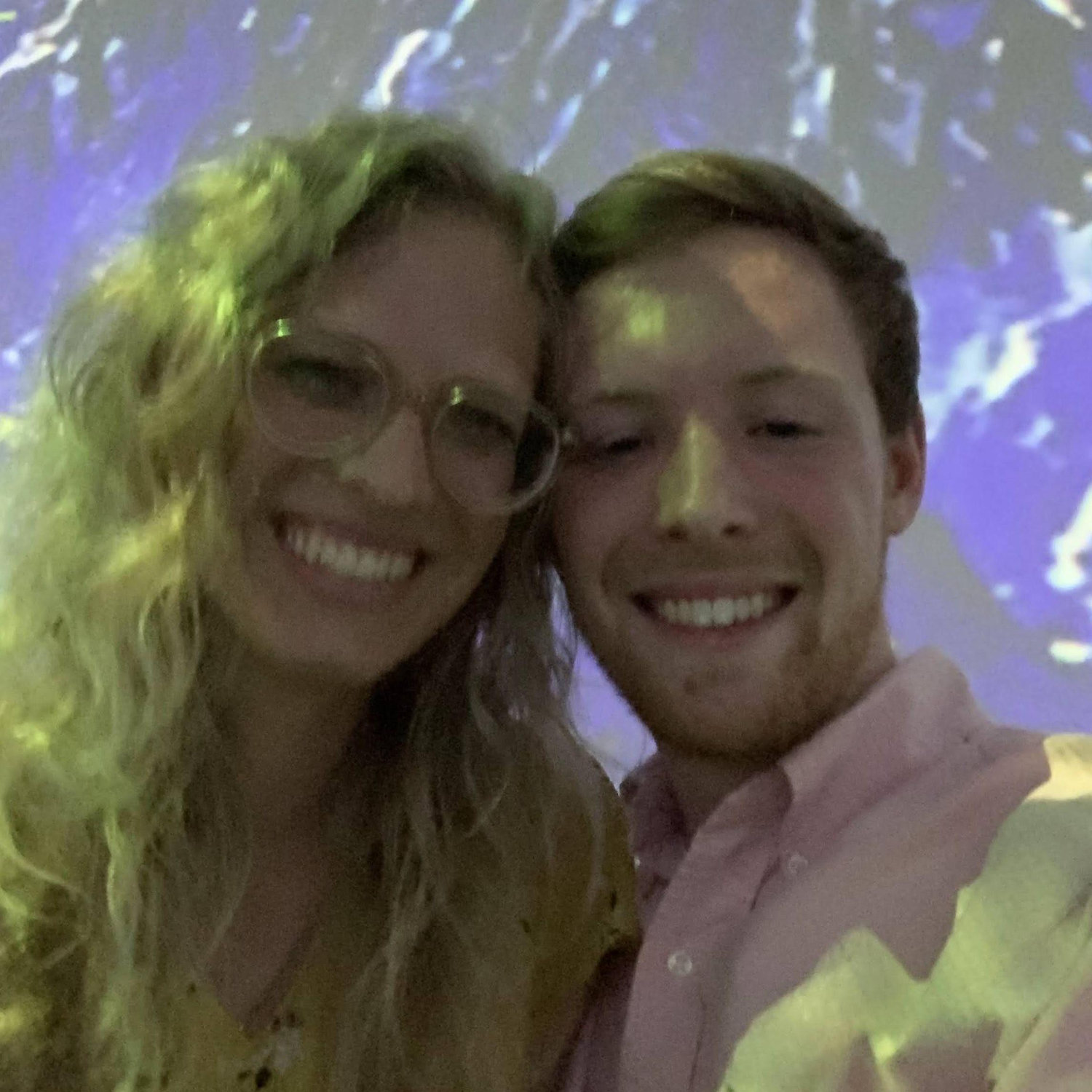 March 2022 - We said 'I love you' for the first time right before this photo at the Immersive Van Gogh Exhibit!