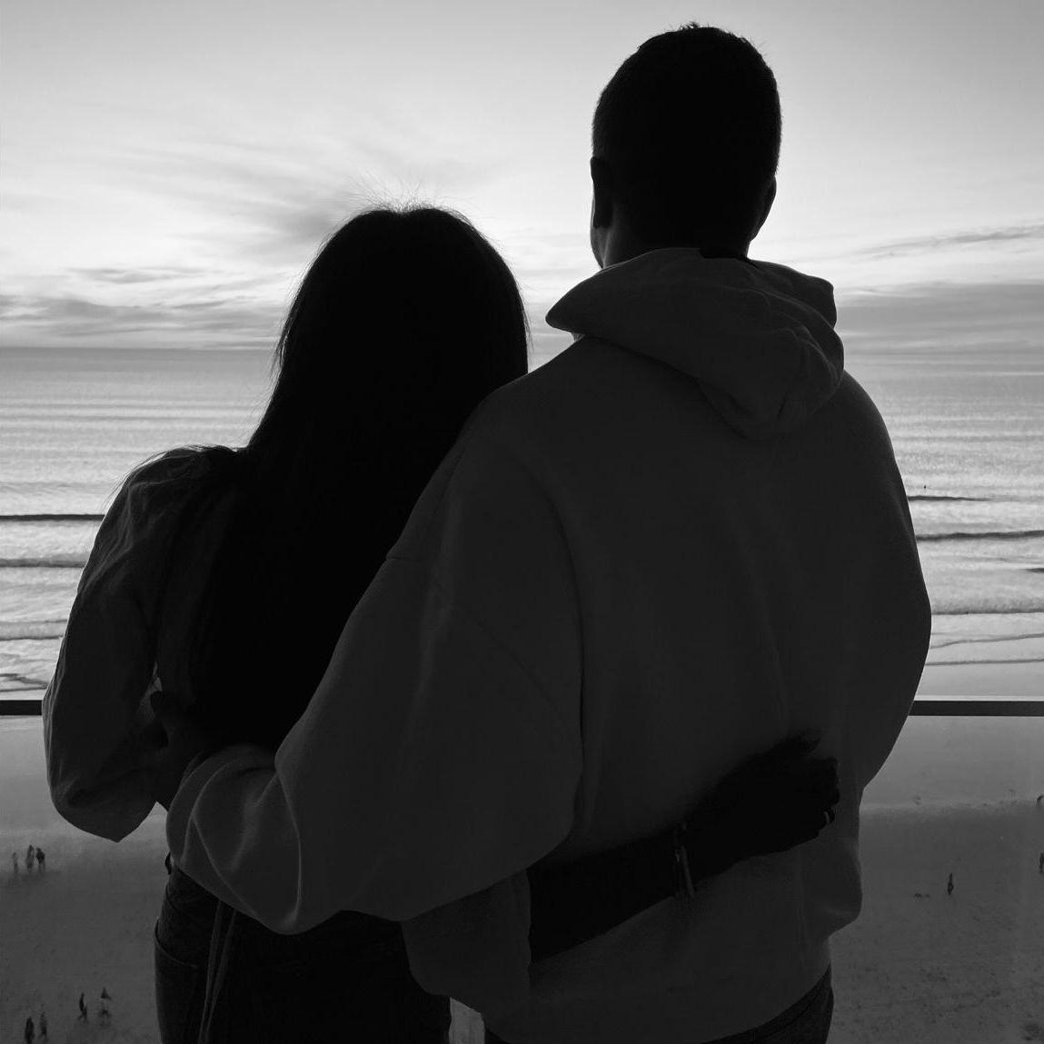 Watching the sunset at Pacific Beach, California.