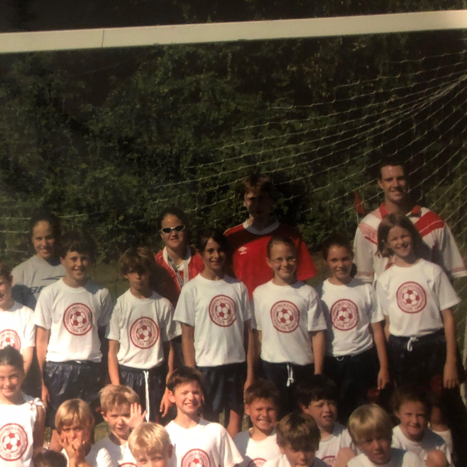 We went to elementary school together and played on the same soccer team! See if you can spot us (and Charlie!) :)