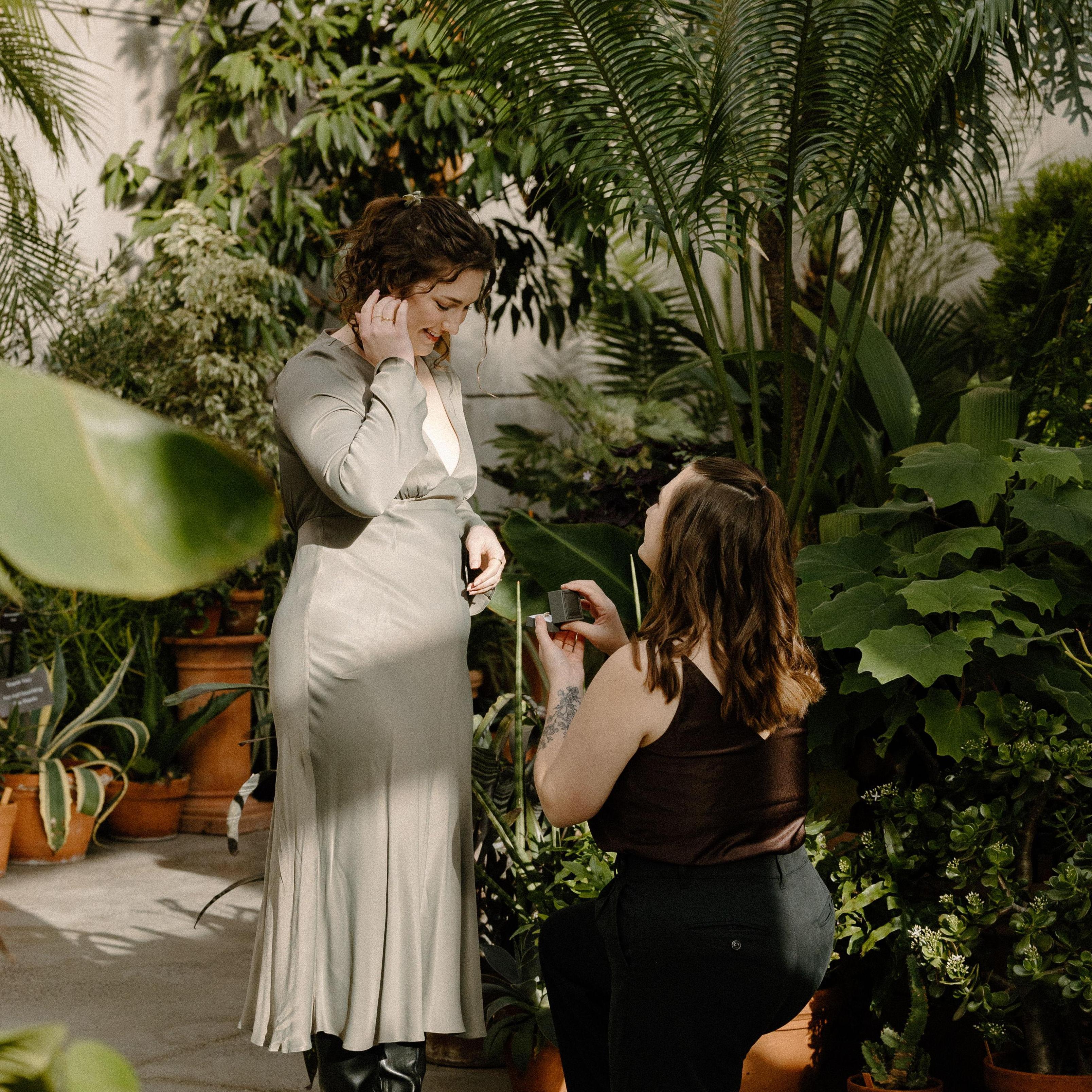 Rosie proposing to Lauren on November 2, 2024, at the New England Botanical Garden at Tower Hill.