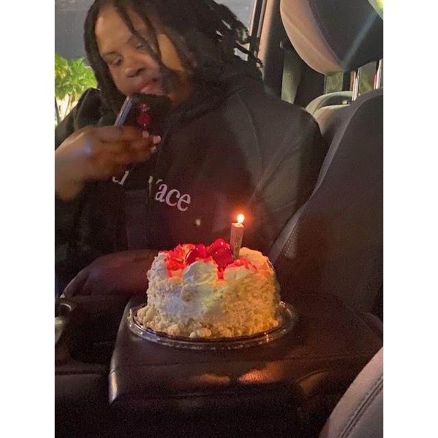 A surprised cake and candle on my Birthday while working on the road in Florida!