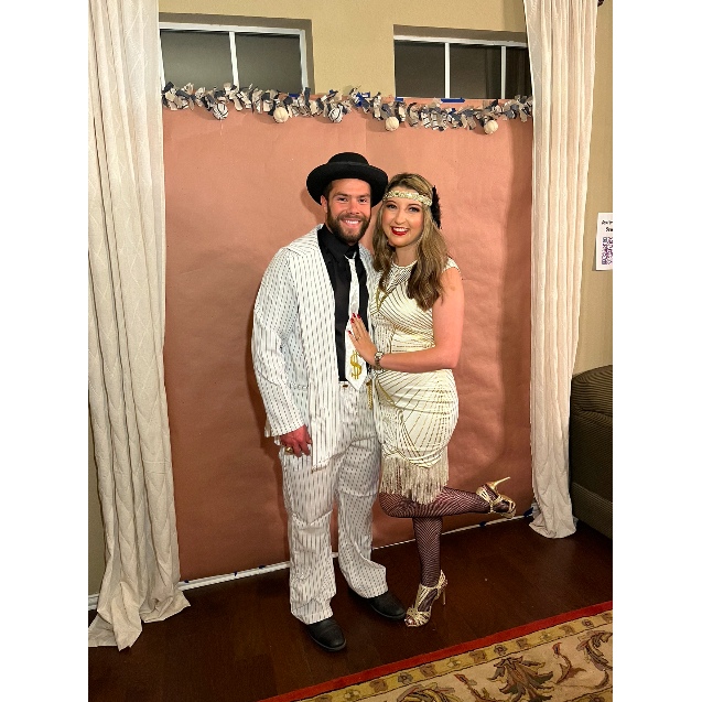 Flapper and gangster on Halloween