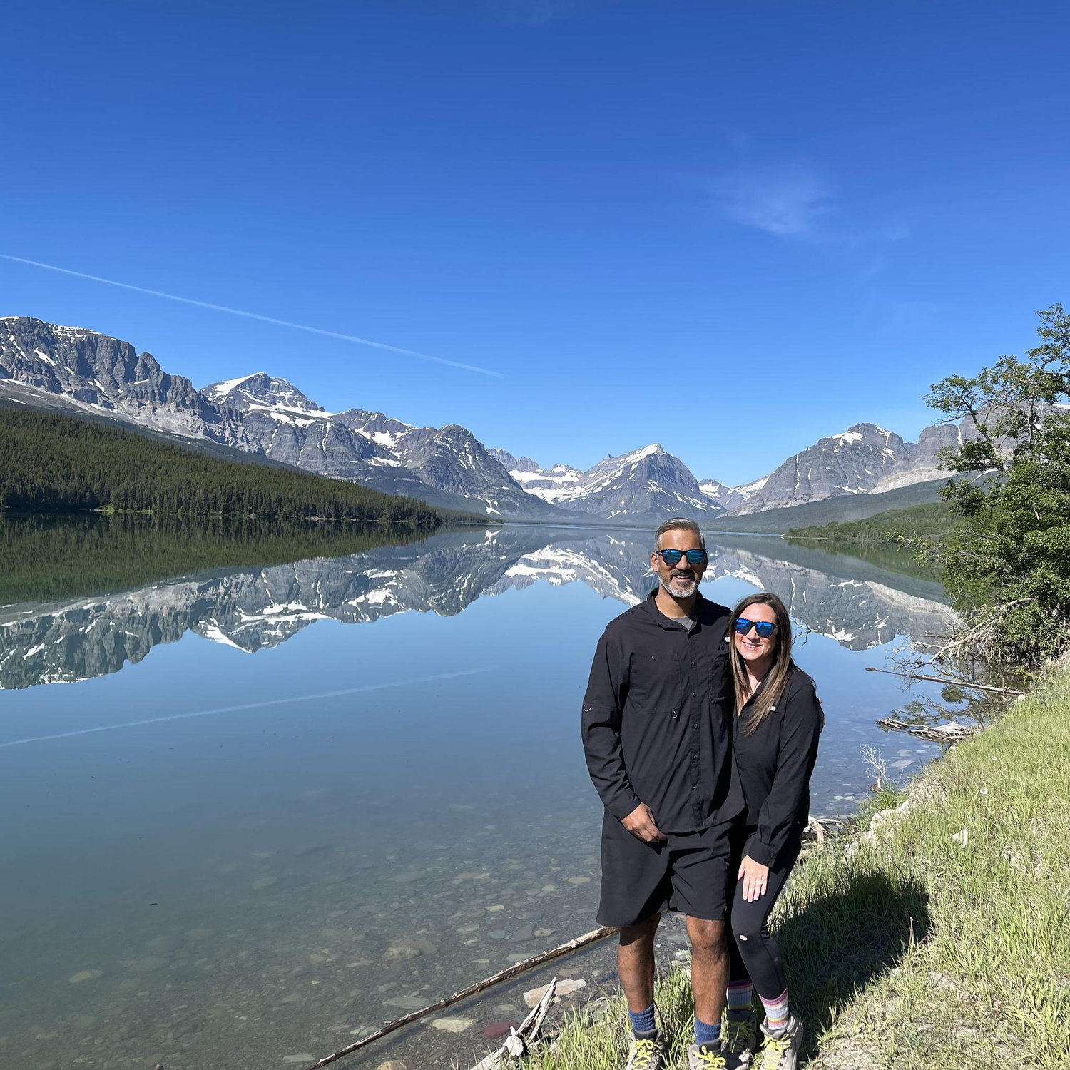 Taking in the breathtaking views of Lake Sherburne in Glacier National Park, Montana.