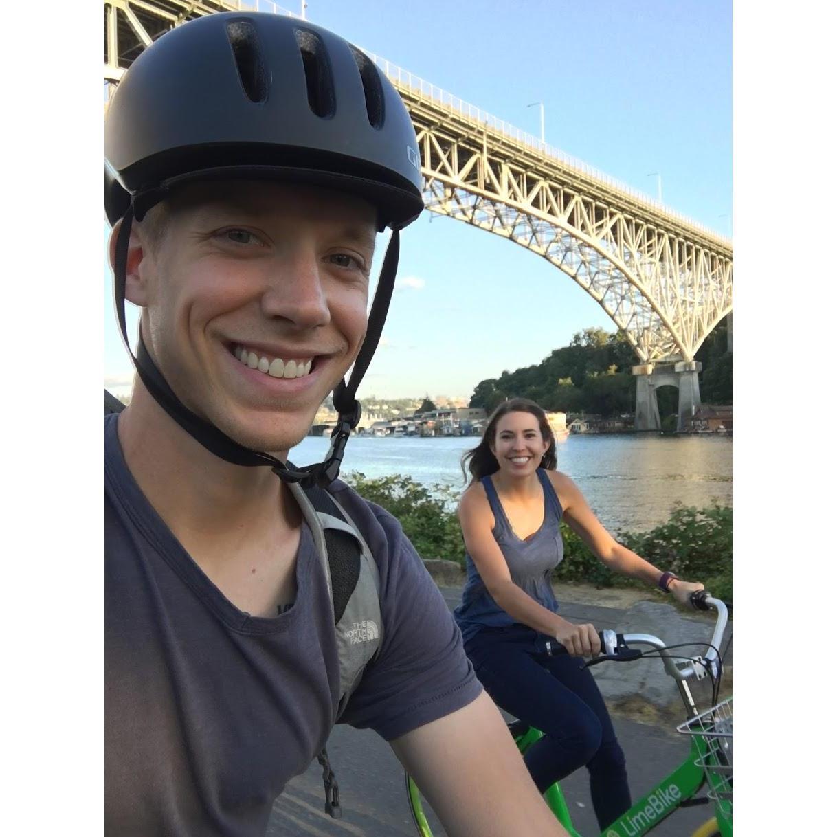 Bike riding in Seattle. Laura throws caution to the wind by not putting on a helmet.