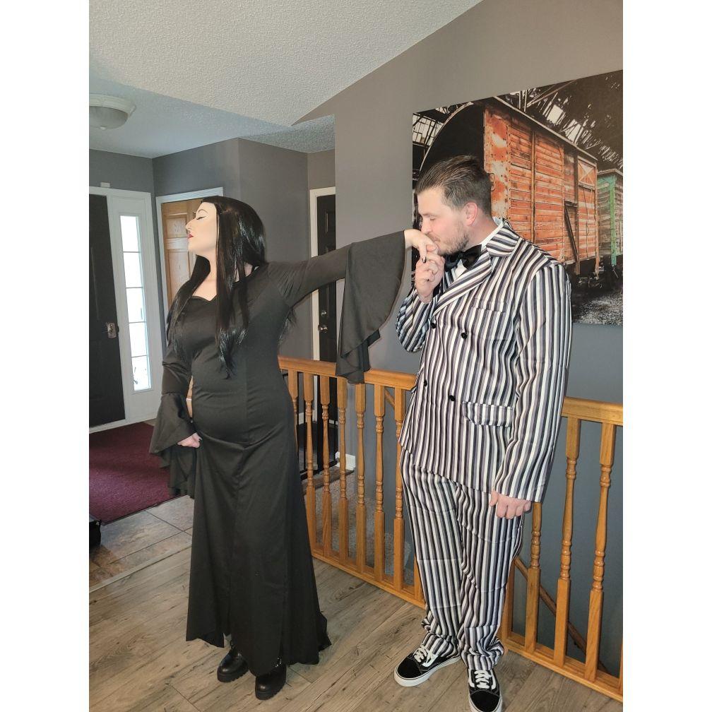 Us as Morticia and Gomez Addams.