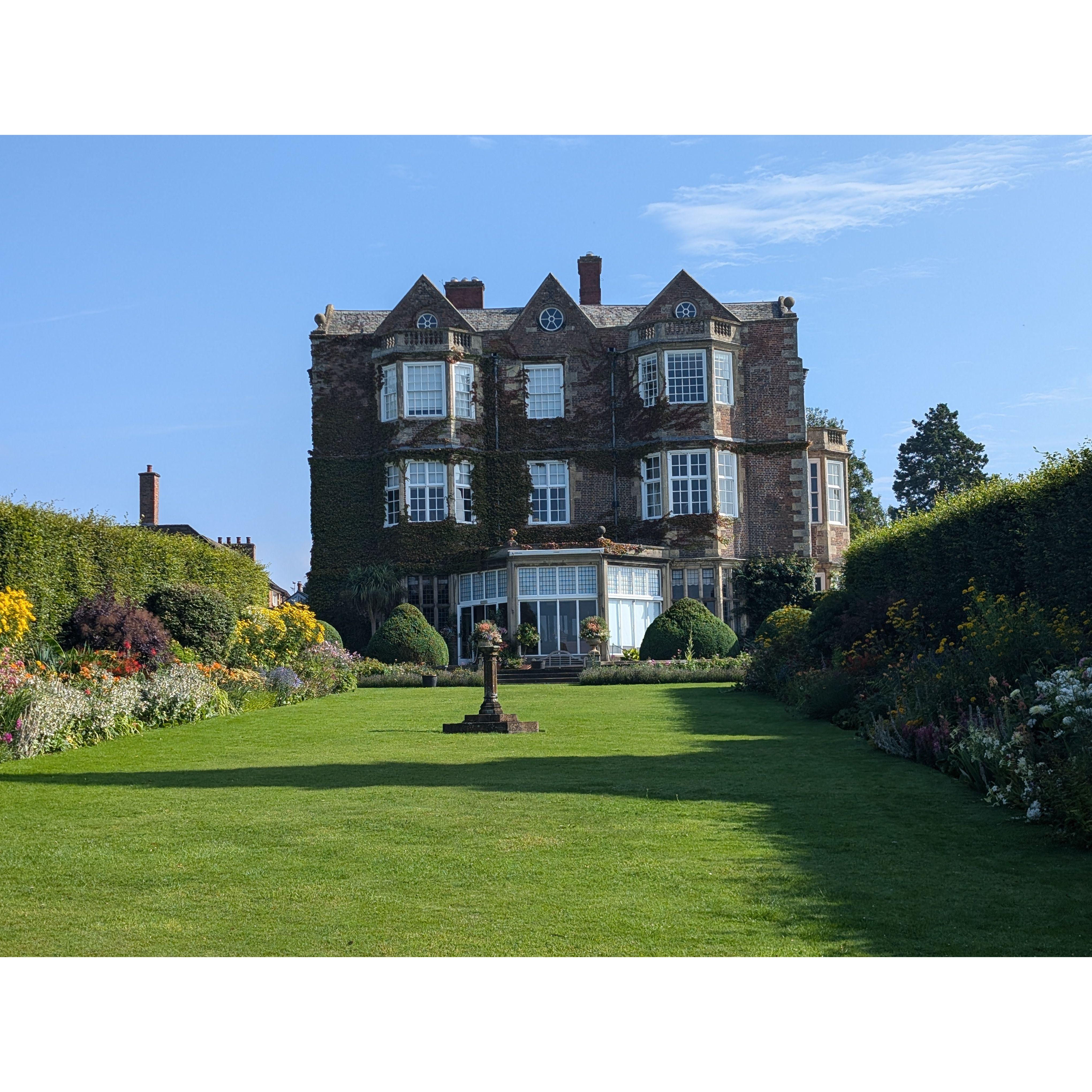 With gardens on both sides, the view looking back at the Hall is gorgeous
