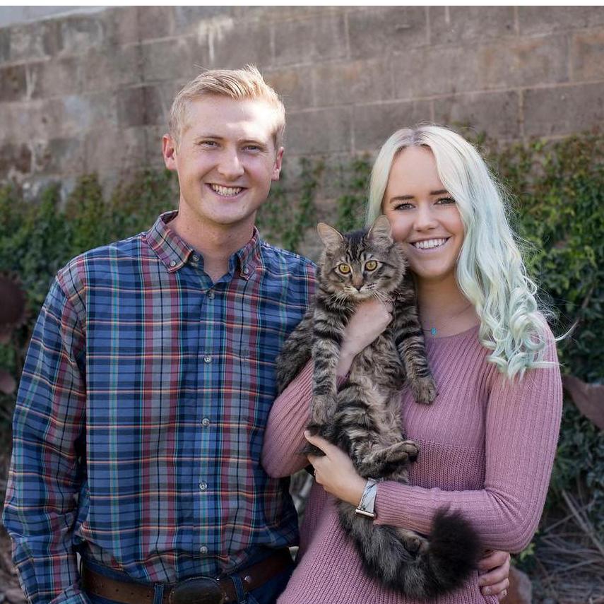 Erica, Ross, and their first fur child, Kygo.