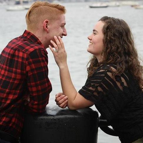 "Not sure how we're supposed to pose, should I touch your face?"