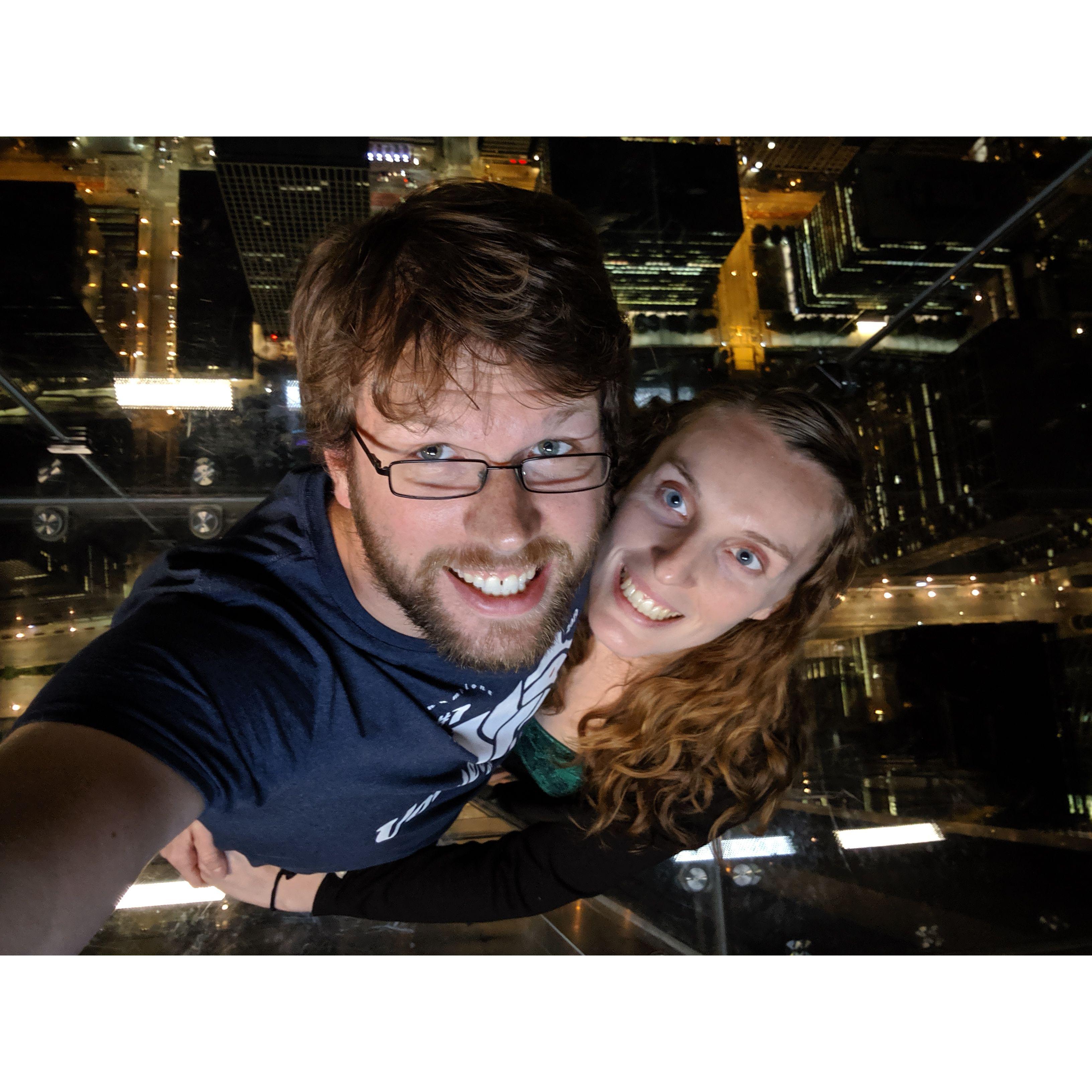 In the glass box at the Sears Tower... erm or is it Willis Tower... Snoopy Tower!!