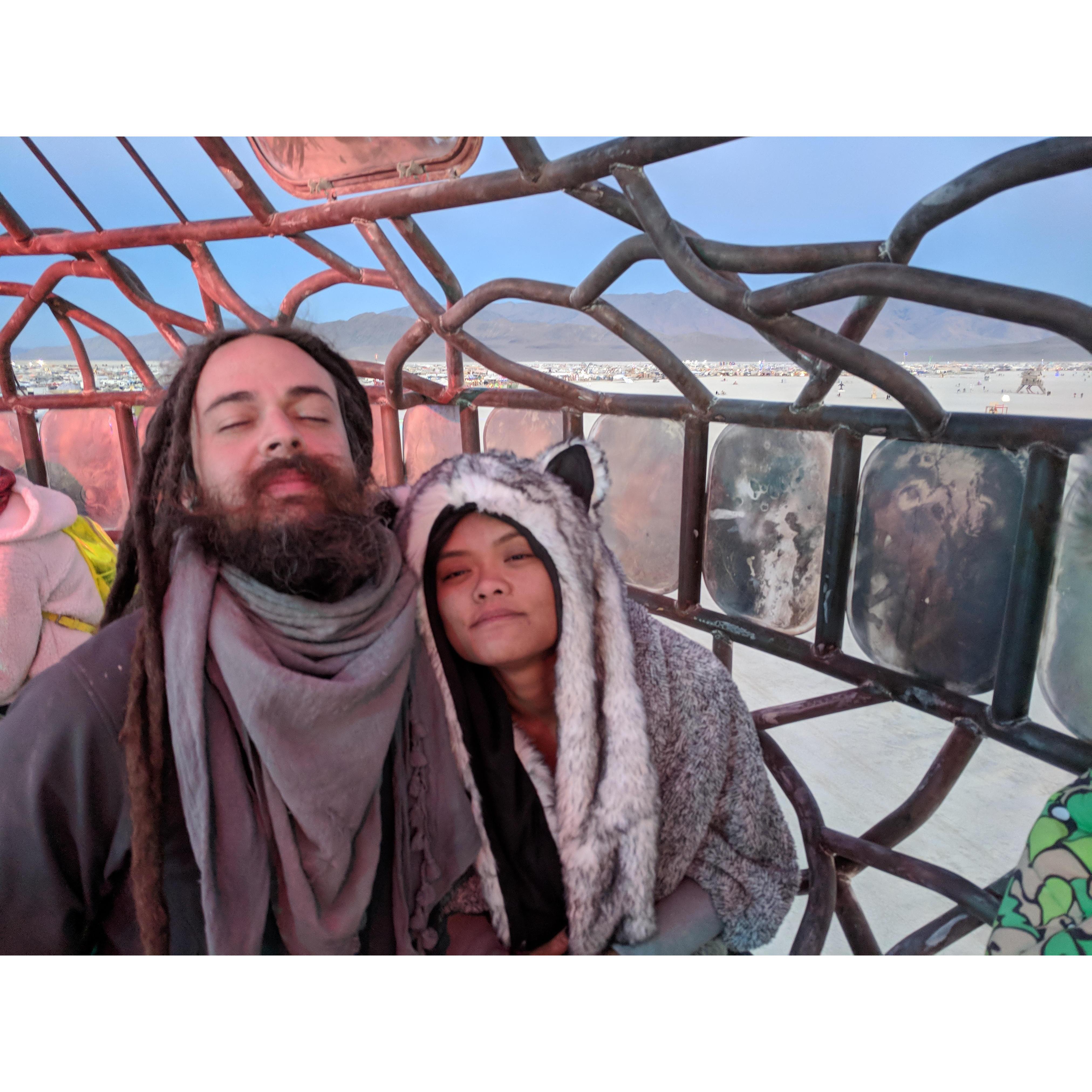 August 2018, Burning Man.  We're so awake for this sunrise.