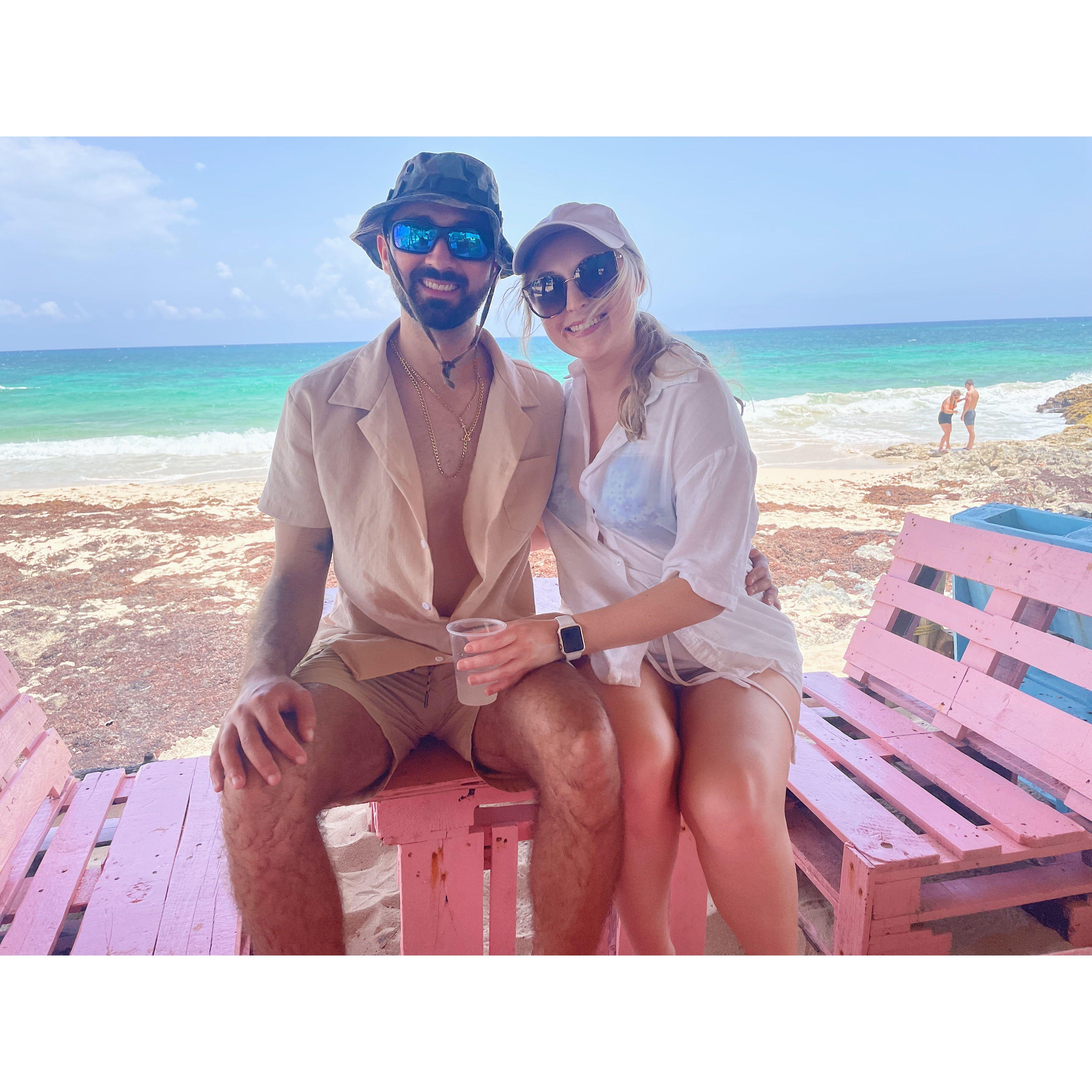 August 2023 -- Emma and Jared at a mojito shack on the side of the road in Cozumel, Mexico.