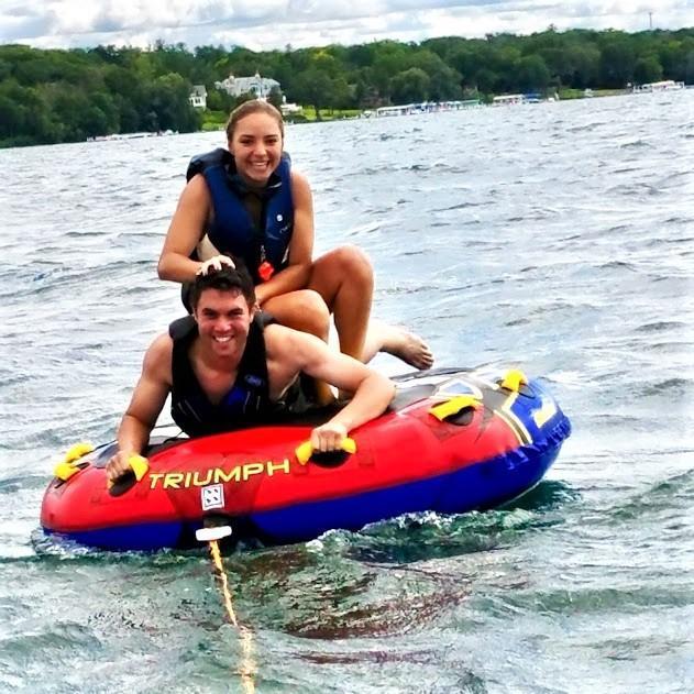 Jackie beating Daniel at tubing.