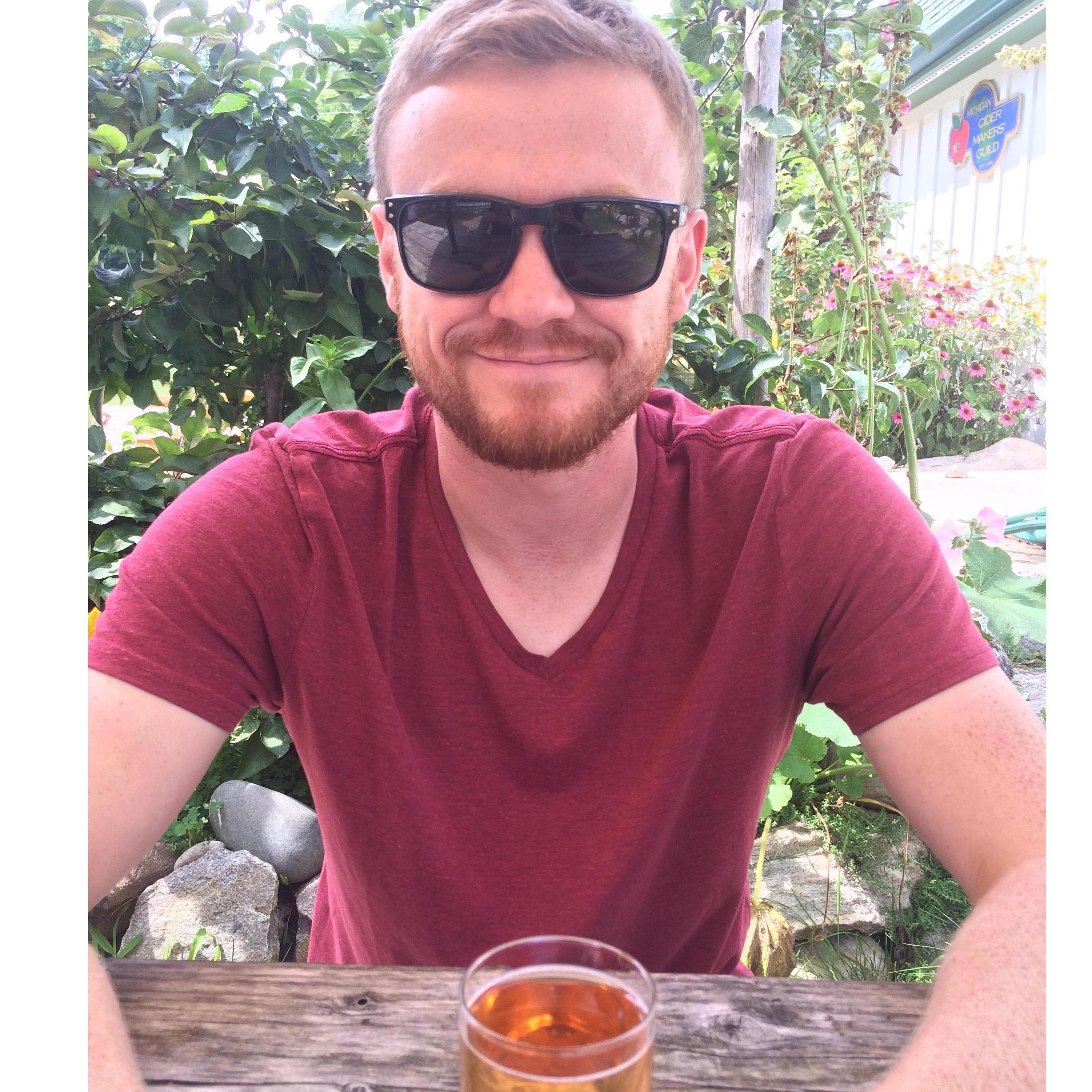 Enjoying a drink at our fave northern MI cidery, Tandem Ciders