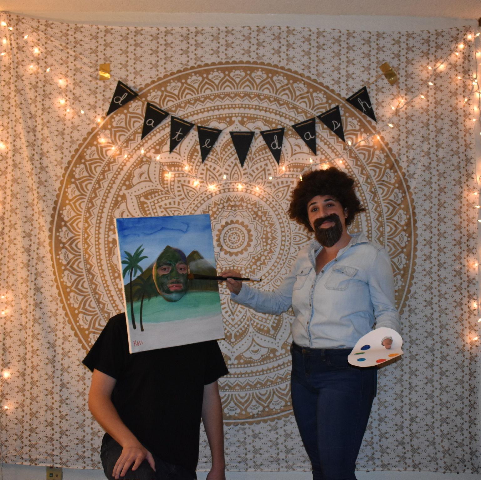 Our iconic Bob Ross and his painting costume.