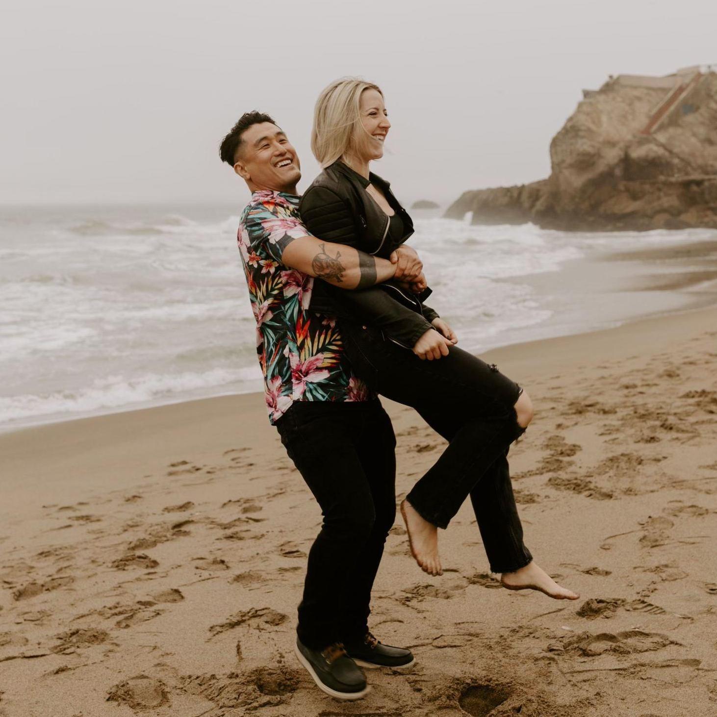 How many photos can we get of Erik carrying Lo?