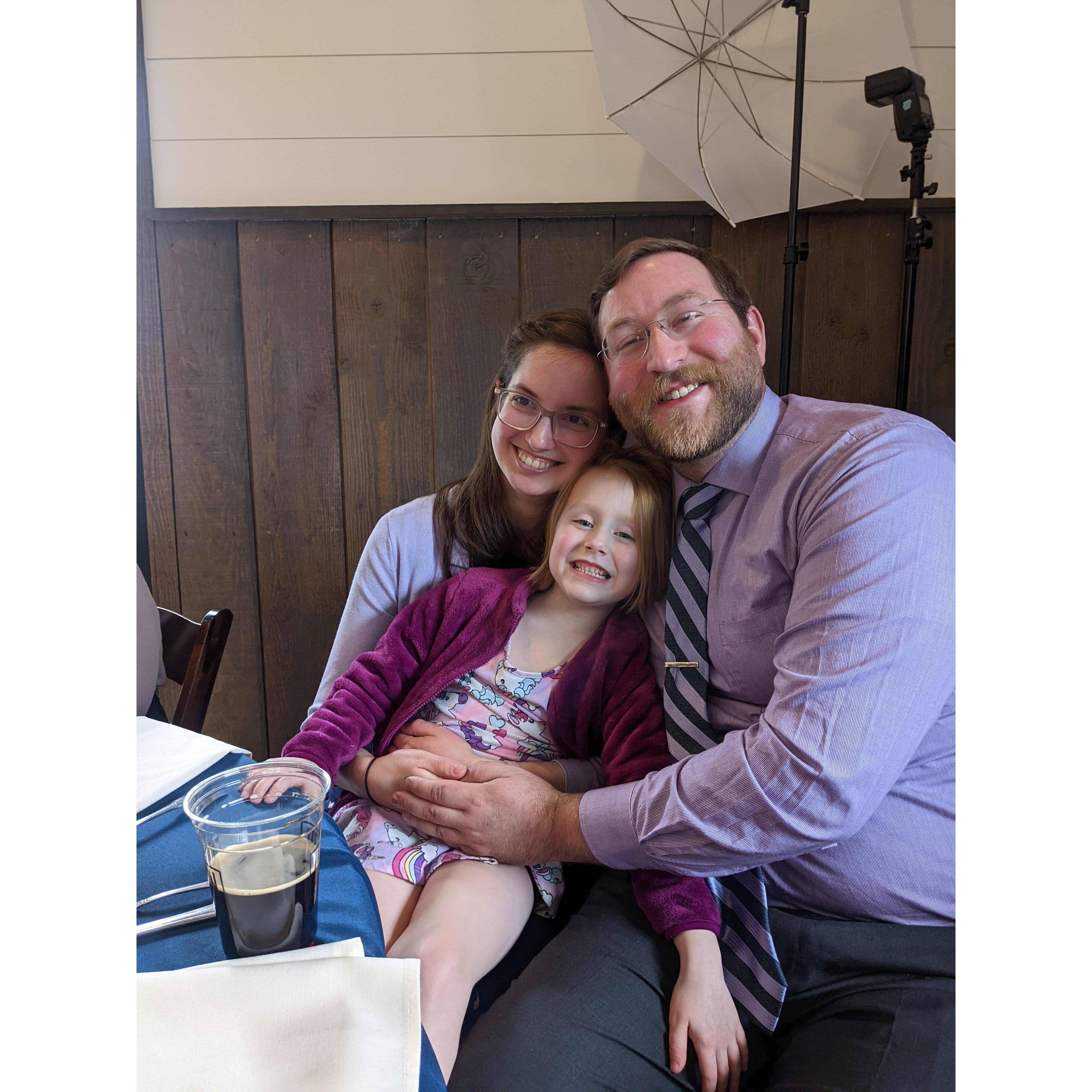 Valerie meeting Stephen's niece for the first time. This little girl couldn't decide whose lap she wanted to sit on...so both!