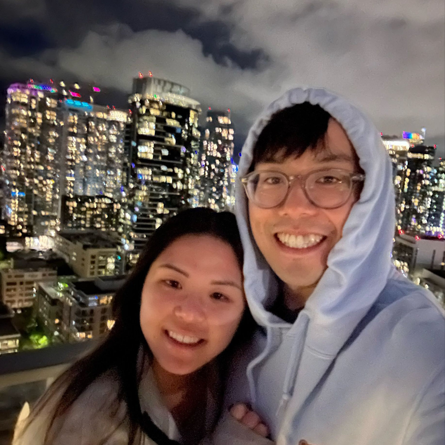 We did it. We moved to Seattle summer of 2024! Selfie on the rooftop of our first apartment together❤️
