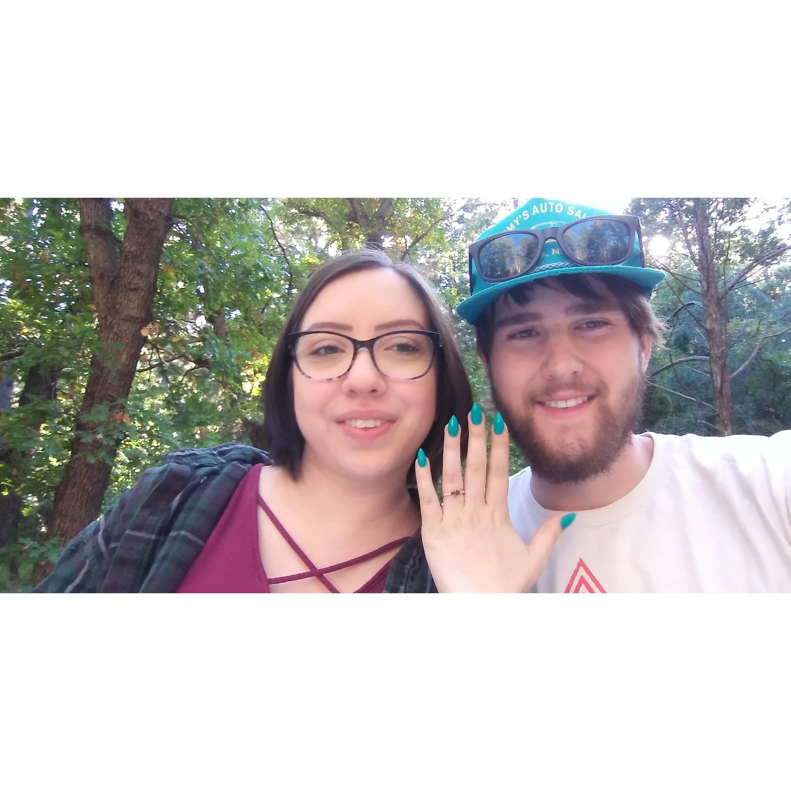 Alex and Peter showing off the engagement ring!