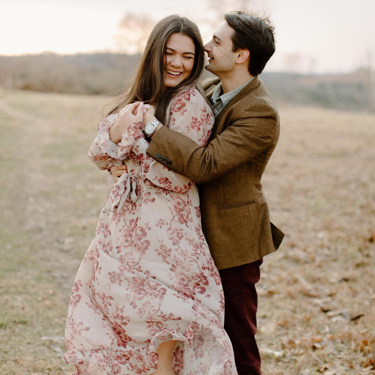 This photo was taken during Amanda and Francis's engagement session on November 26th, 2021! You can't notice from the picture, but the couple was absolutely freezing during their shoot with Carina.