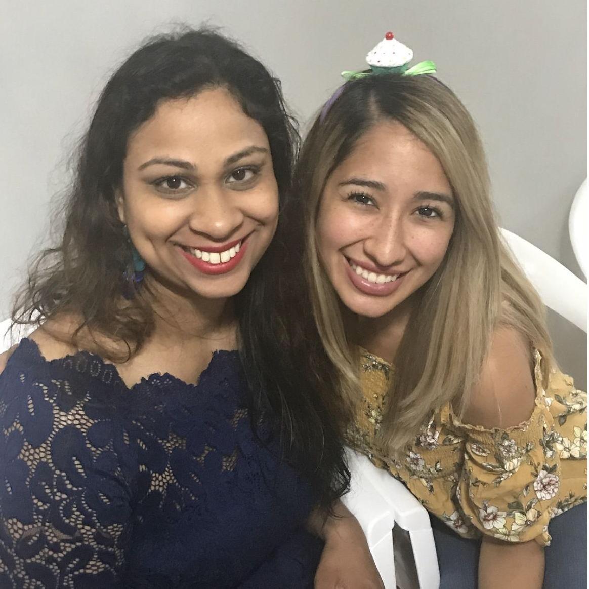 Jackie and her Matron of Honor and best friend Deva pose together at her daughter's 1st birthday party.