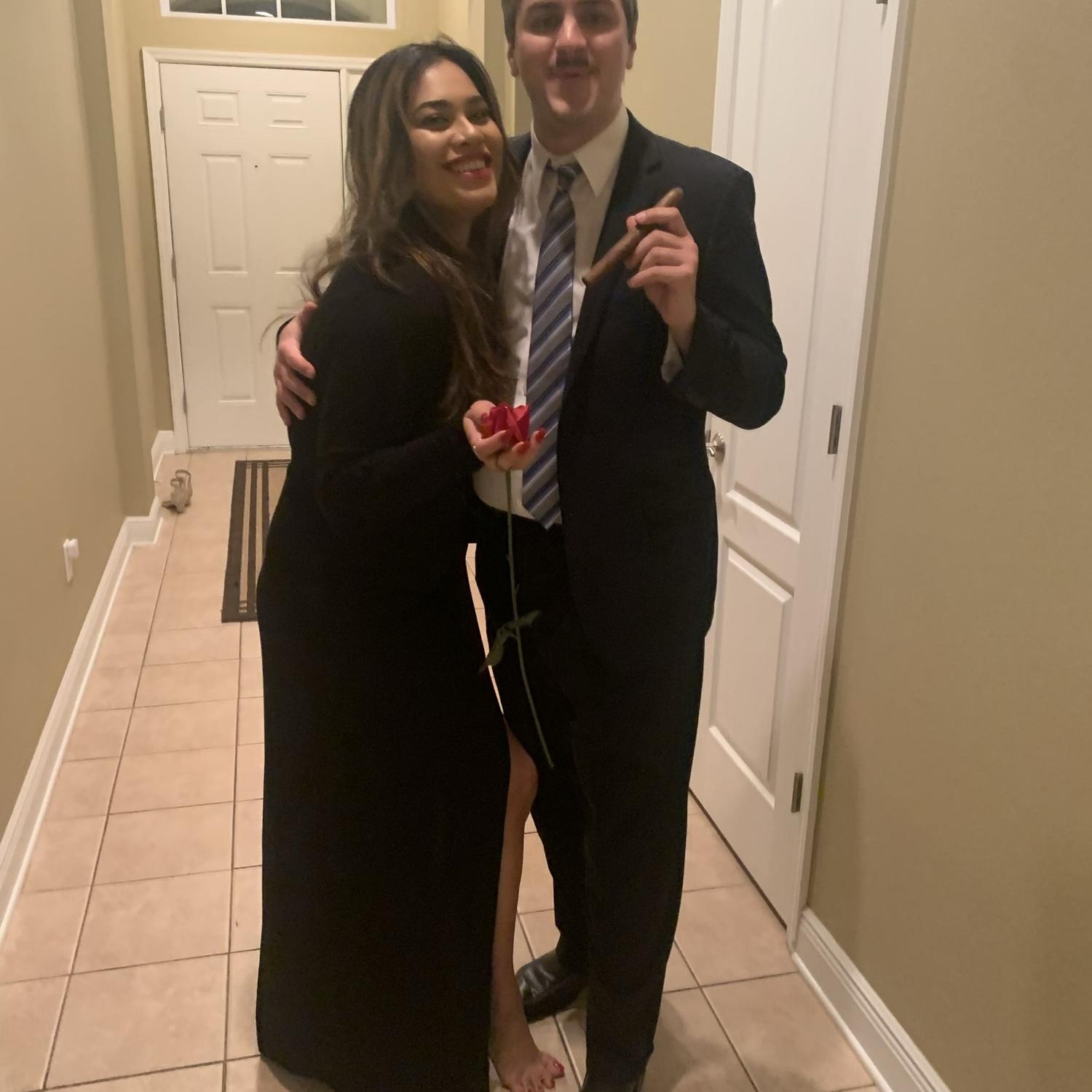 Halloween 2021 as Morticia and Gomez Addam. 👻