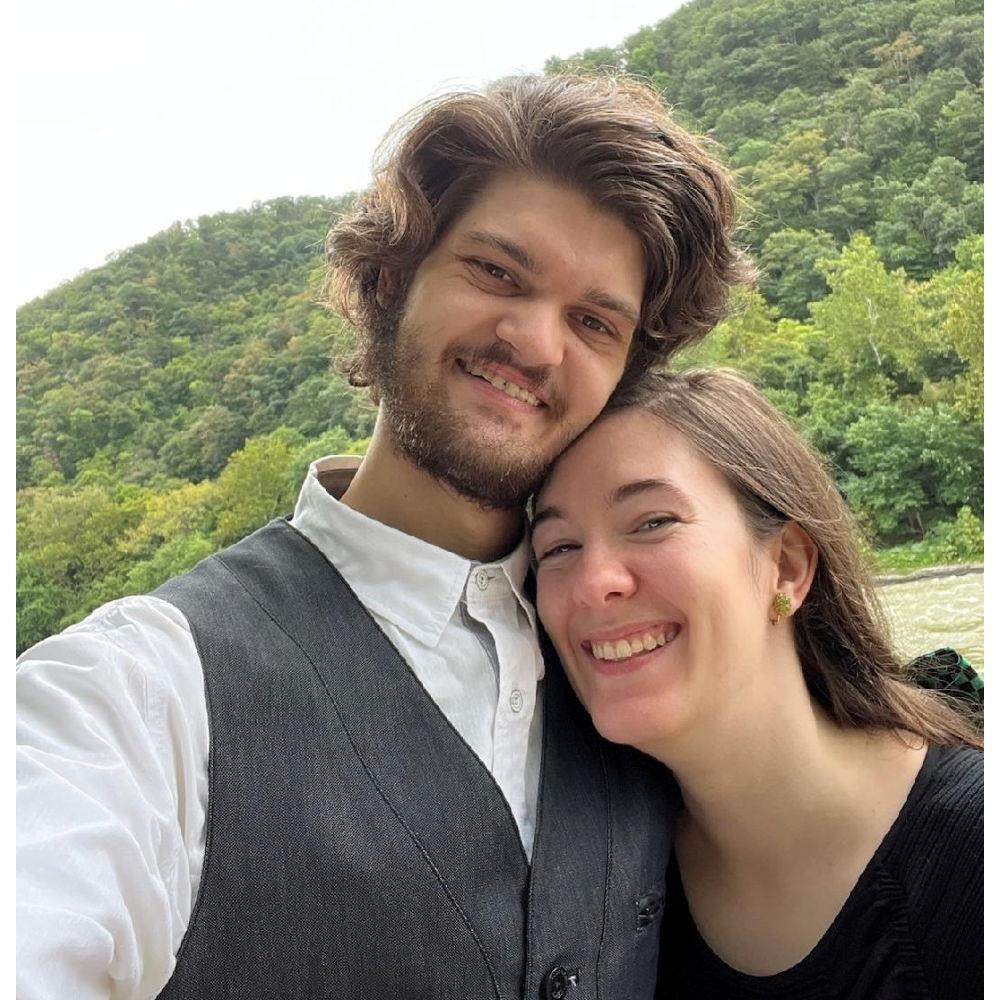 In 2022 Jacob and I pose by the Shenandoah River in Harpers Ferry to commemorate our first year dating. The year following, he proposed on this very spot!