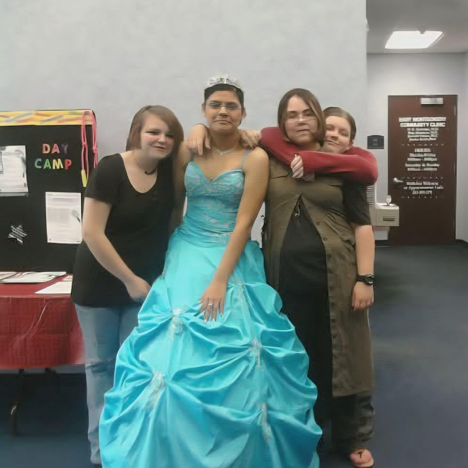 Lizbeth in her Quince dress. My hair was so short back then!