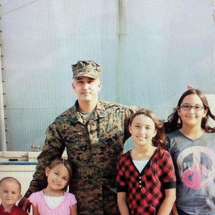 Brittany with her sisters, Allison and Megan, with her father and brother, Eric J. Smith and Eric B. Smith