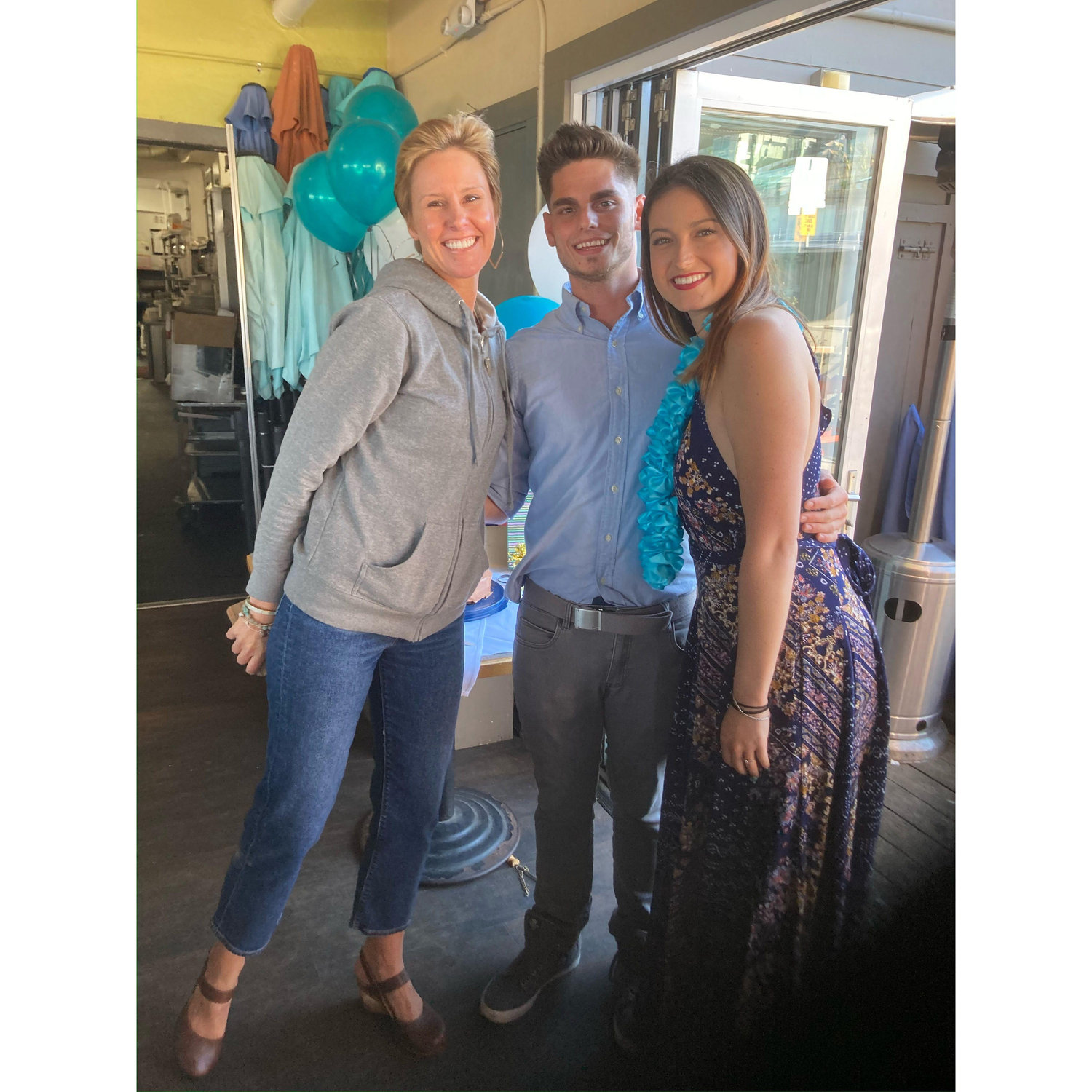 Shannon and Jason host themselves a going away party at Ideal Bar and Grill in Santa Cruz. The couple worked here during school and the pandemic and grew close with the staff and managers.