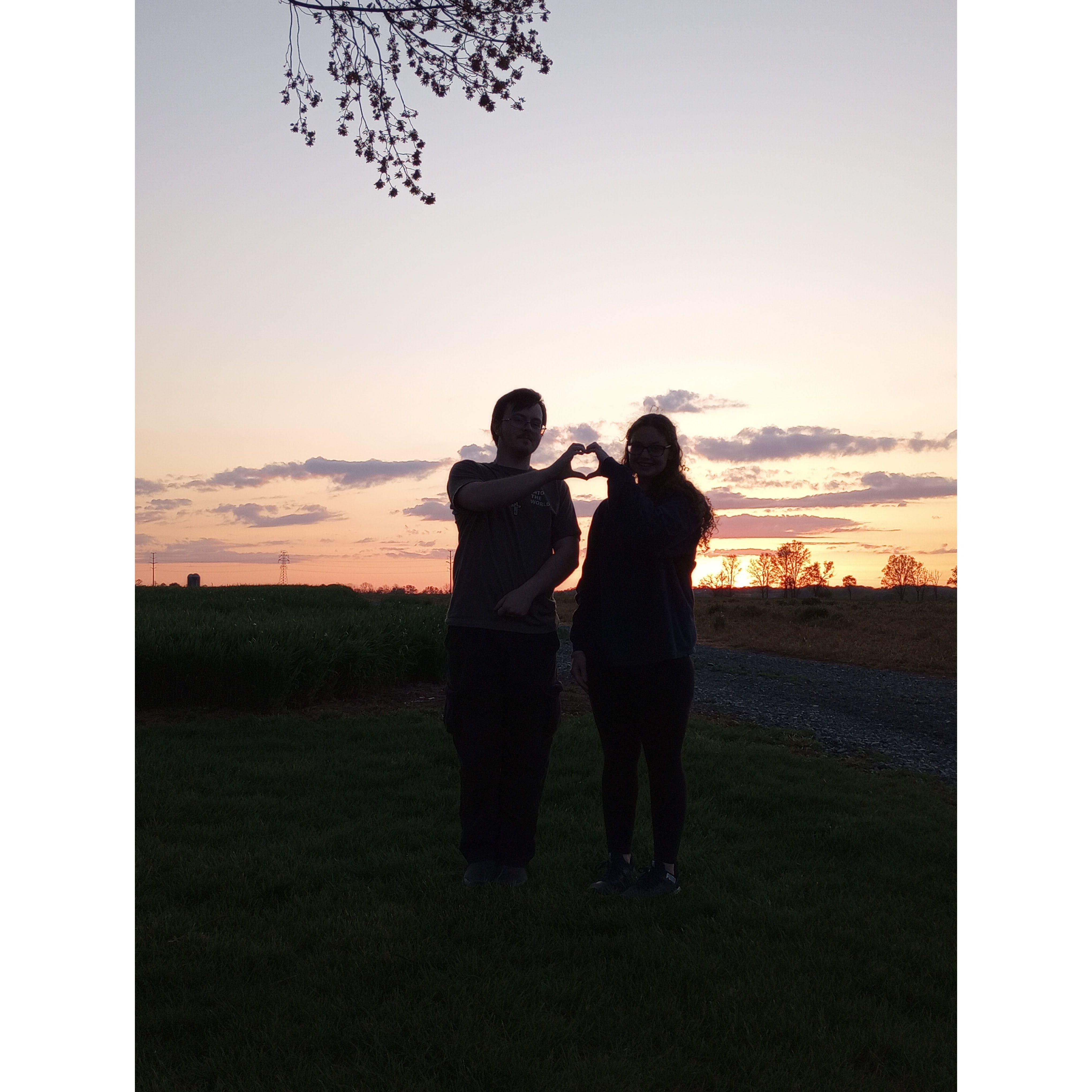The kids and their silhouette heart hand pictures...