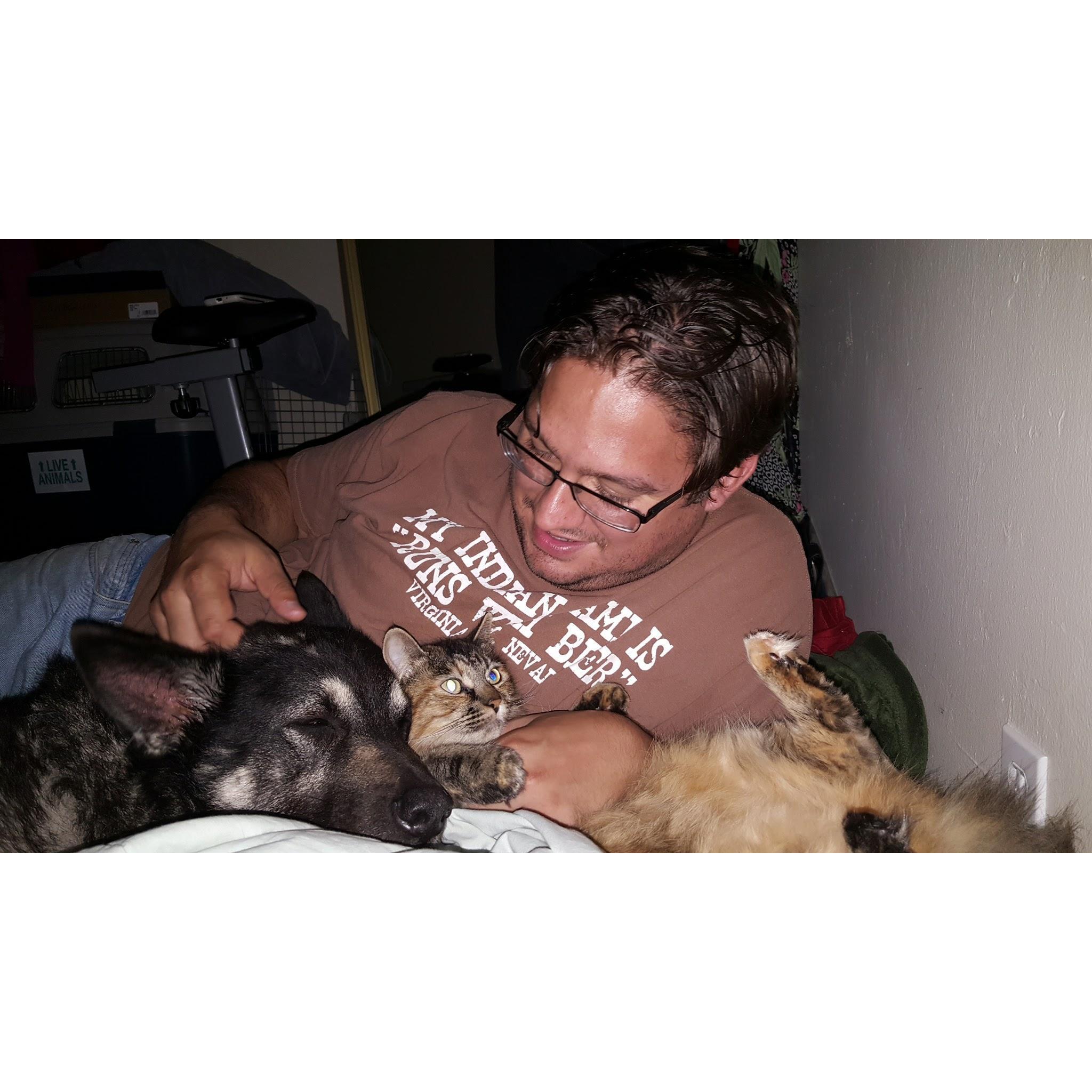 Loving on Kitten and Walter in a Virginia City shirt.