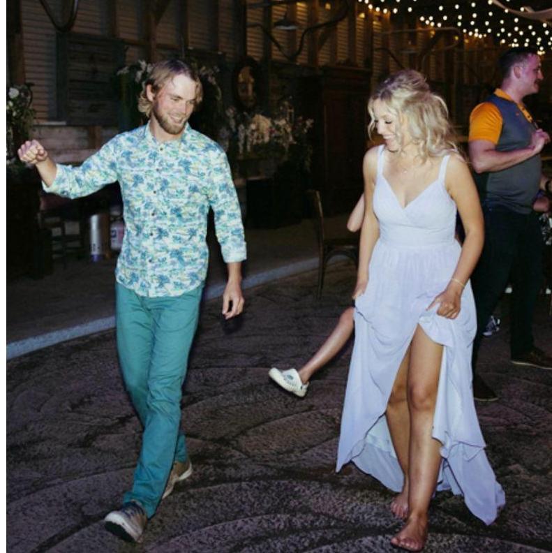 Evan trying to teach me to dance at my best friend's wedding. :)