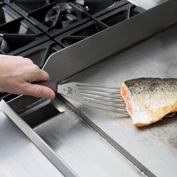 Mercer Culinary M18390 Hell's Handle® High Heat 9" x 4" Fish / Egg Turner / Spatula