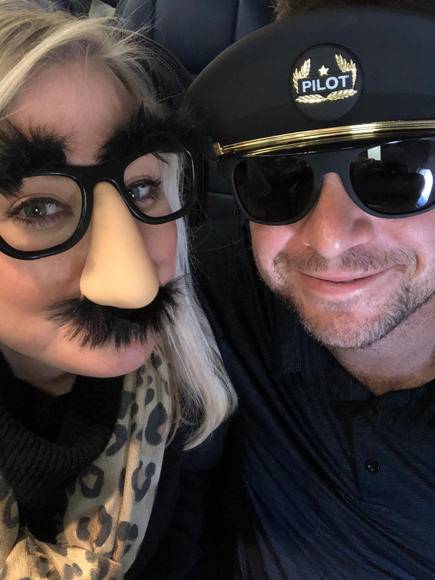 Incognito on our Halloween flight to California... he actually wore the glasses with hairy nose through the airport!! 🤦🏼‍♀️🤣