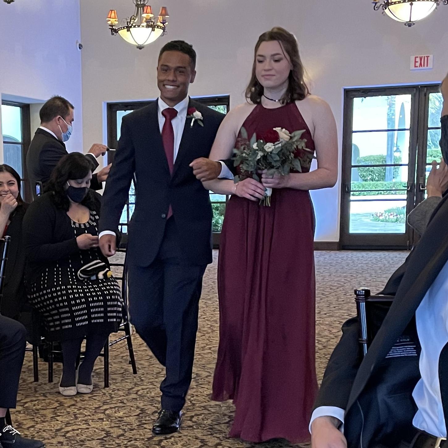 DJ and Stacy walking down the aisle at Jenson and Kylani's wedding as best man and maid of honor
