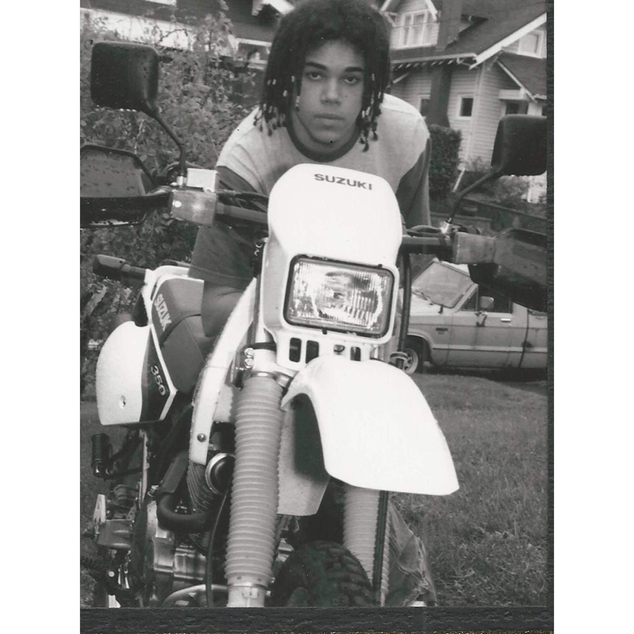 Portland, Oregon-Teenage Ethan with his first motorcycle.