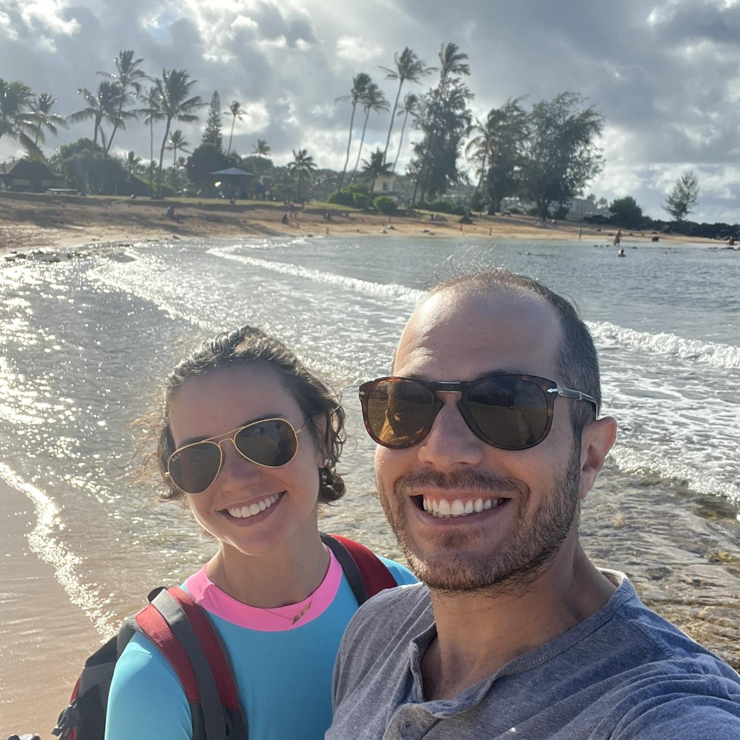 Just off camera is a giant turtle just hanging out on the beach.
