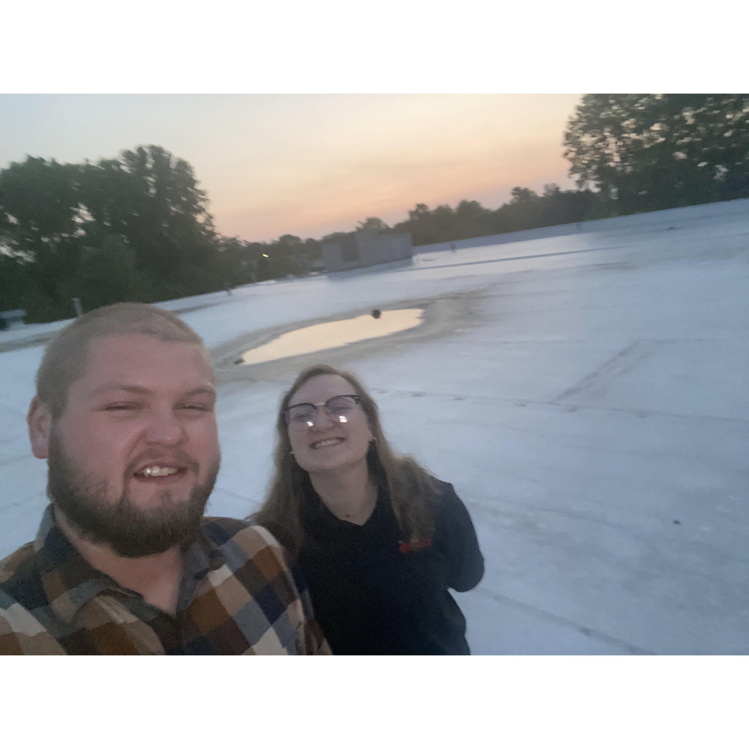Our first picture together on top of the roof at work admiring the sunrise