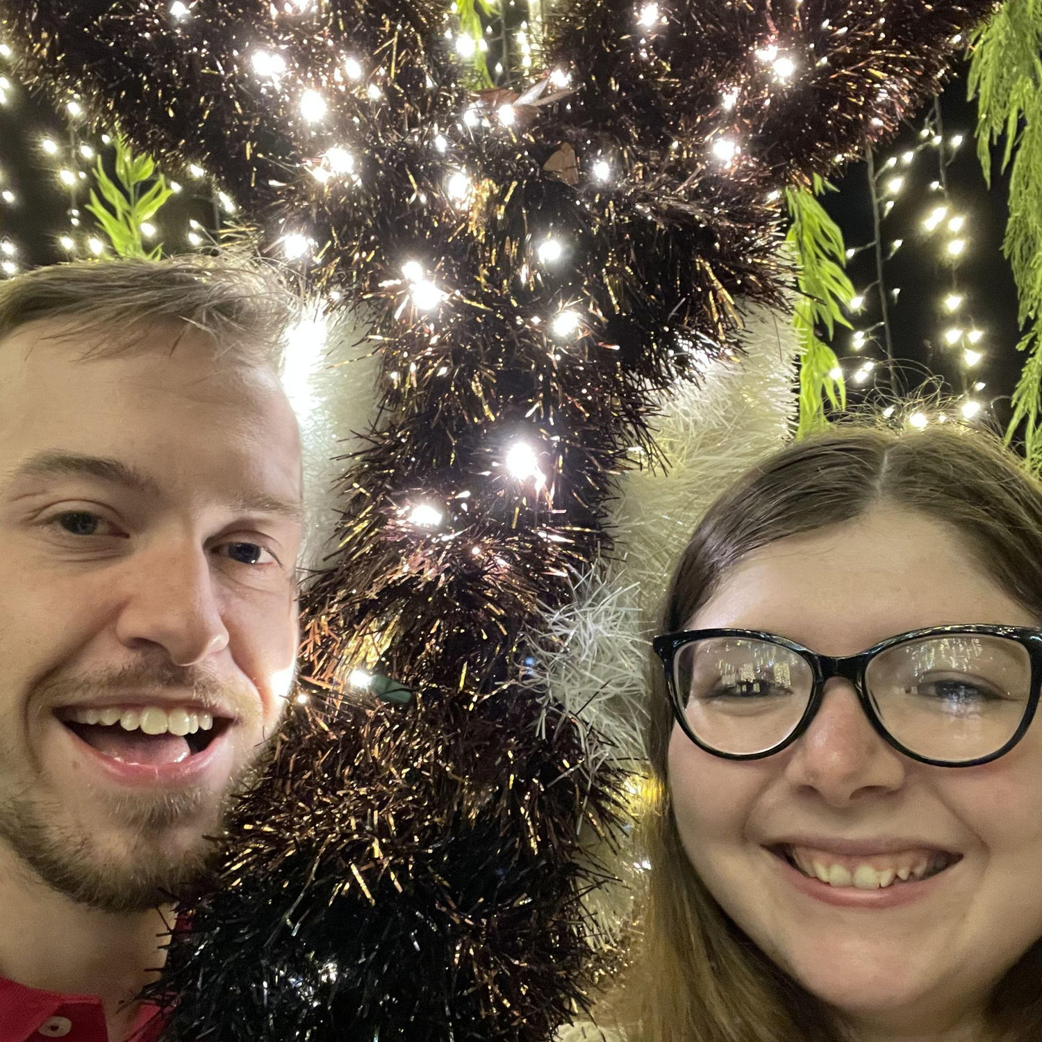 First year together at the Greensboro Science Center Winter Wonderlights (with a light up okapi, the animal  we were visiting when we got engaged years later)
