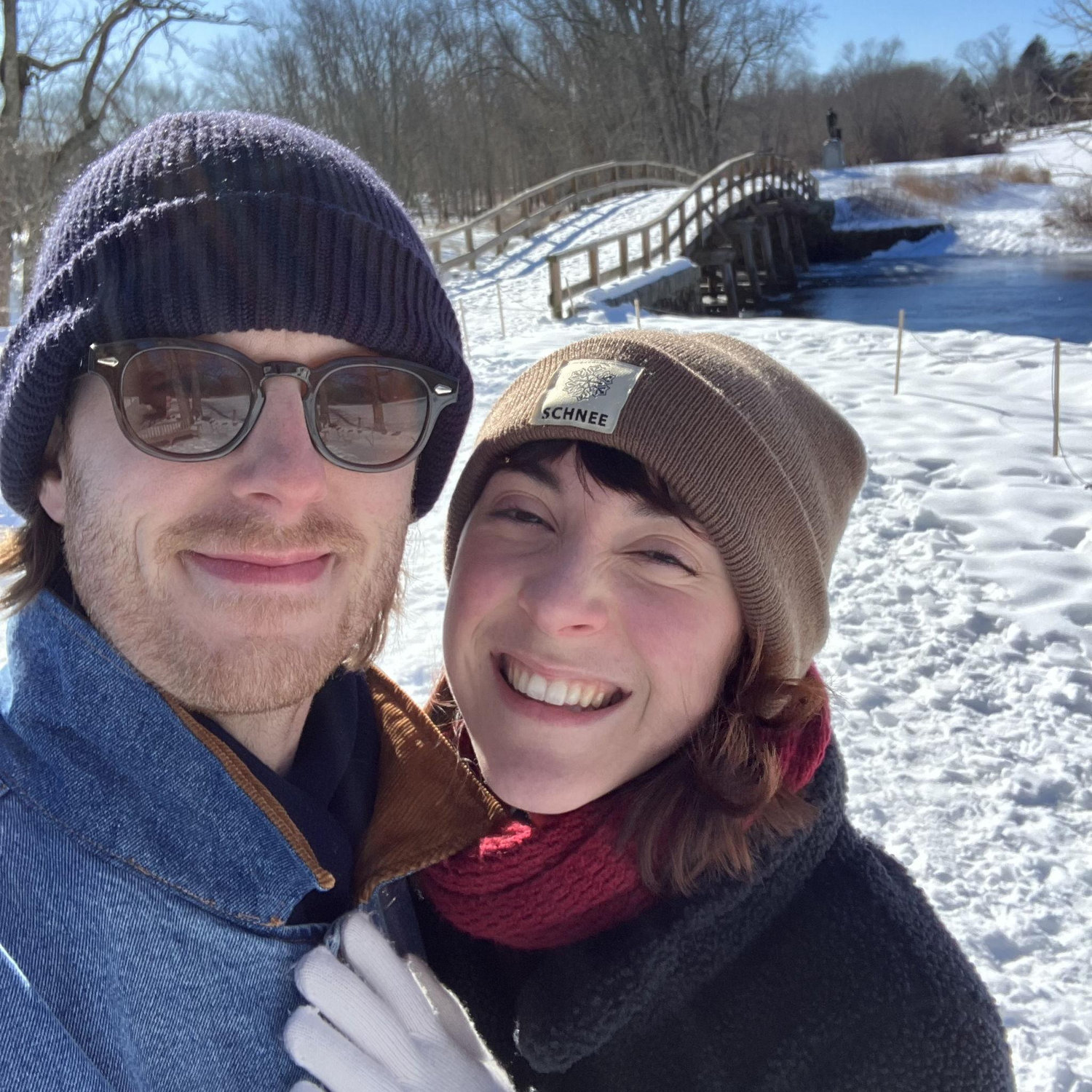 Us in front of the Old North Bridge in Concord, MA, site of the Shot Heard Around the World! (Bella cried.)