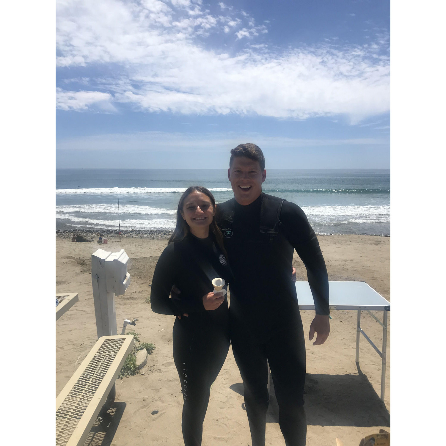 Colleen made Colin wait to go surfing while he sweated it out in his wetsuit so she could grab a soft serve ice cream cone from the ice cream truck